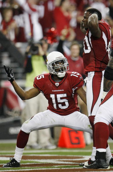 GLENDALE, AZ - JANUARY 10:  Wide receiver Early Doucet #80 of the Arizona Cardinals celebrates a touchdown against the Green Bay Packers with teammate Steve Breaston #15 during the second quarter of the 2010 NFC wild-card playoff game at University of Pho