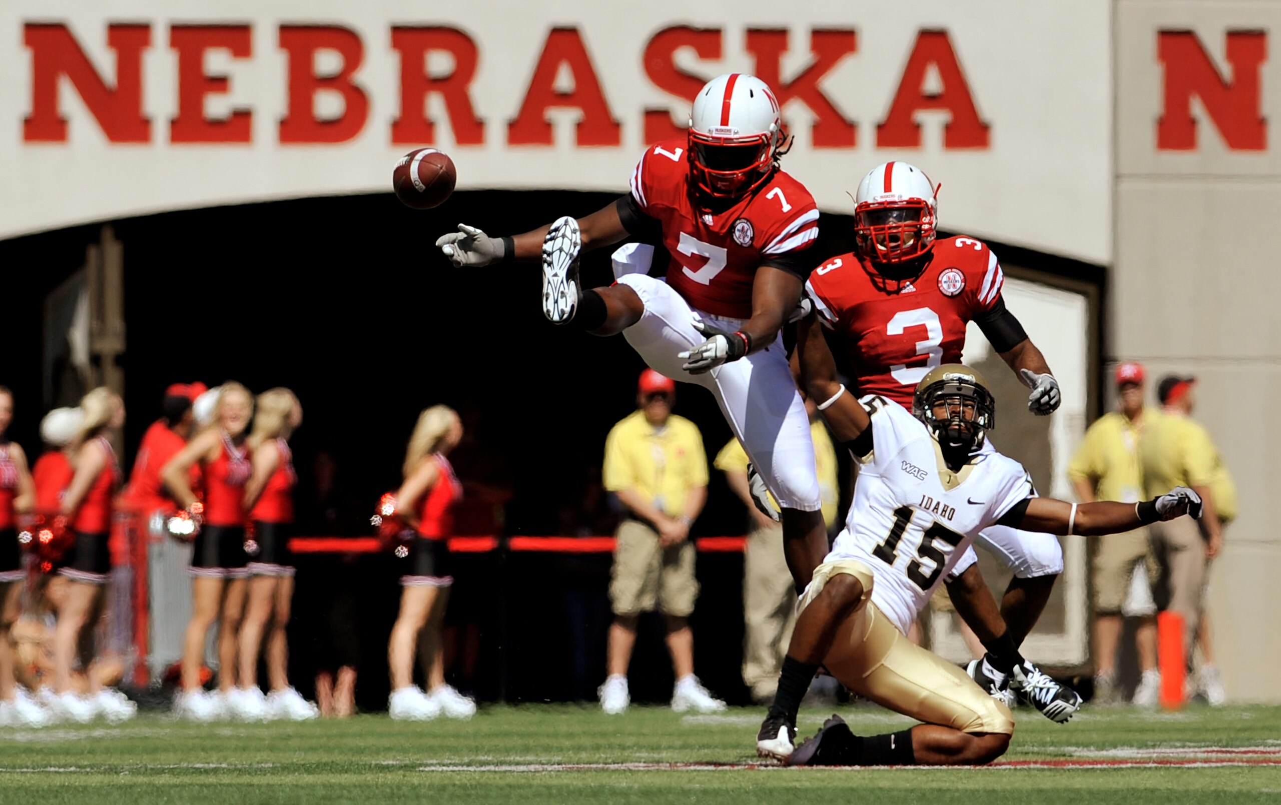 LINCOLN, NE - SEPTEMBER 11: Nebraska Cornhuskers defensive back DeJon Gomes #7 and safety Rickey Thenarse #3 knock a pass away from Idaho Vandals wide receiver Marsel Posey #15 during first half action of their game at Memorial Stadium on September 4, 201
