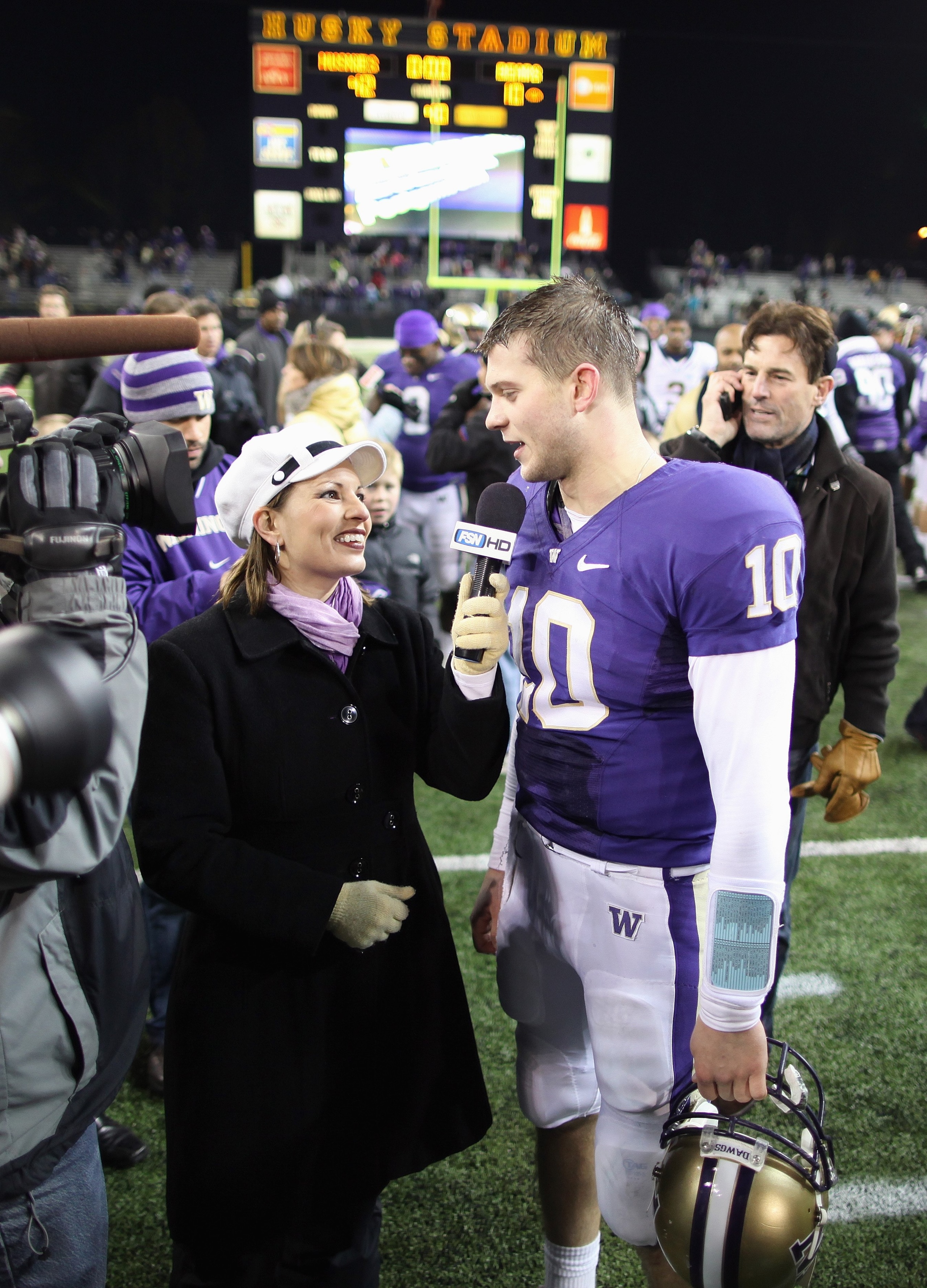 SEATTLE - DECEMBER 05:  Quarterback Jake Locker #10 of the Washington Huskies speaks to a reporter after winning the game against the California Bears on December 5, 2009 at Husky Stadium in Seattle, Washington. The Huskies defeated the Bears 42-10. (Phot