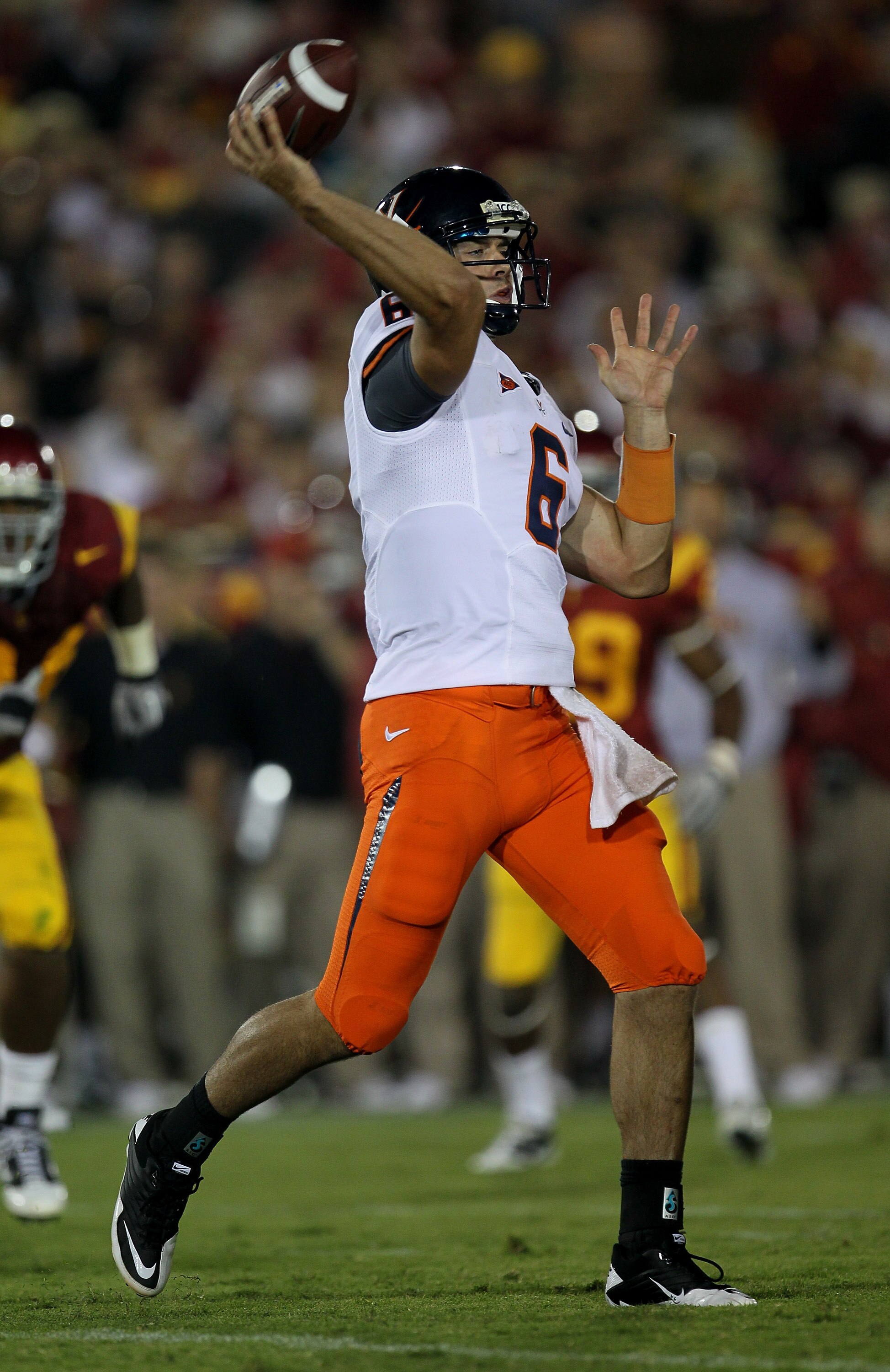LOS ANGELES, CA - SEPTEMBER 11:  Quarterback Marc Verica #6 of the Virginia Cavaliers throws a pass against the USC Trojans at Los Angeles Memorial Coliseum on September 11, 2010 in Los Angeles, California. USC won 17-14.  (Photo by Stephen Dunn/Getty Ima