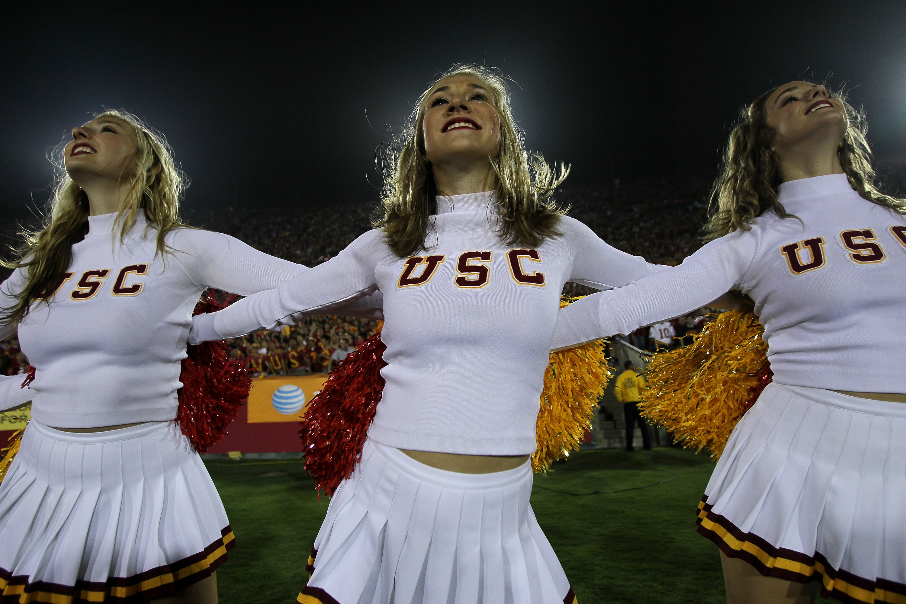 LOS ANGELES - SEPTEMBER 11:   The USC Trojans Song Girls cheerleader team performs in the game with the Virginia Cavaliers at Los Angeles Memorial Coliseum on September 11, 2010 in Los Angeles, California. USC won 17-14.  (Photo by Stephen Dunn/Getty Imag