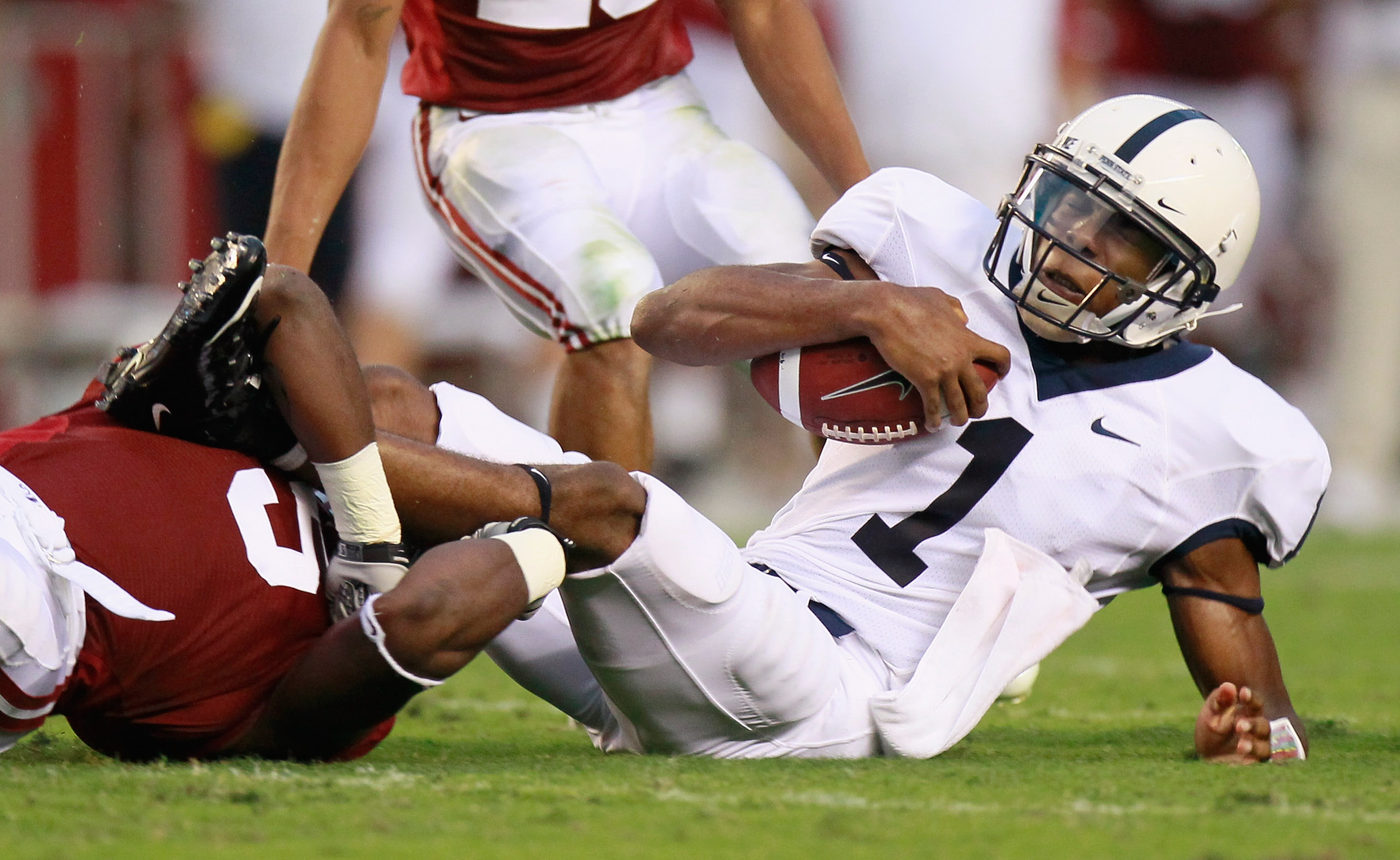 TUSCALOOSA, AL - SEPTEMBER 11: Quarterback Robert Bolden #1 of the Penn State Nittany Lions is sacked by Jerrell Harris #5 of the Alabama Crimson Tide at Bryant-Denny Stadium on September 11, 2010 in Tuscaloosa, Alabama. (Photo by Kevin C. Cox/Getty Ima TUSCALOOSA, AL - SEPTEMBER 11: Quarterback Robert Bolden #1 of the Penn State Nittany Lions is sacked by Jerrell Harris #5 of the Alabama Crimson Tide at Bryant-Denny Stadium on September 11, 2010 in Tuscaloosa, Alabama. (Photo by Kevin C. Cox/Getty Ima