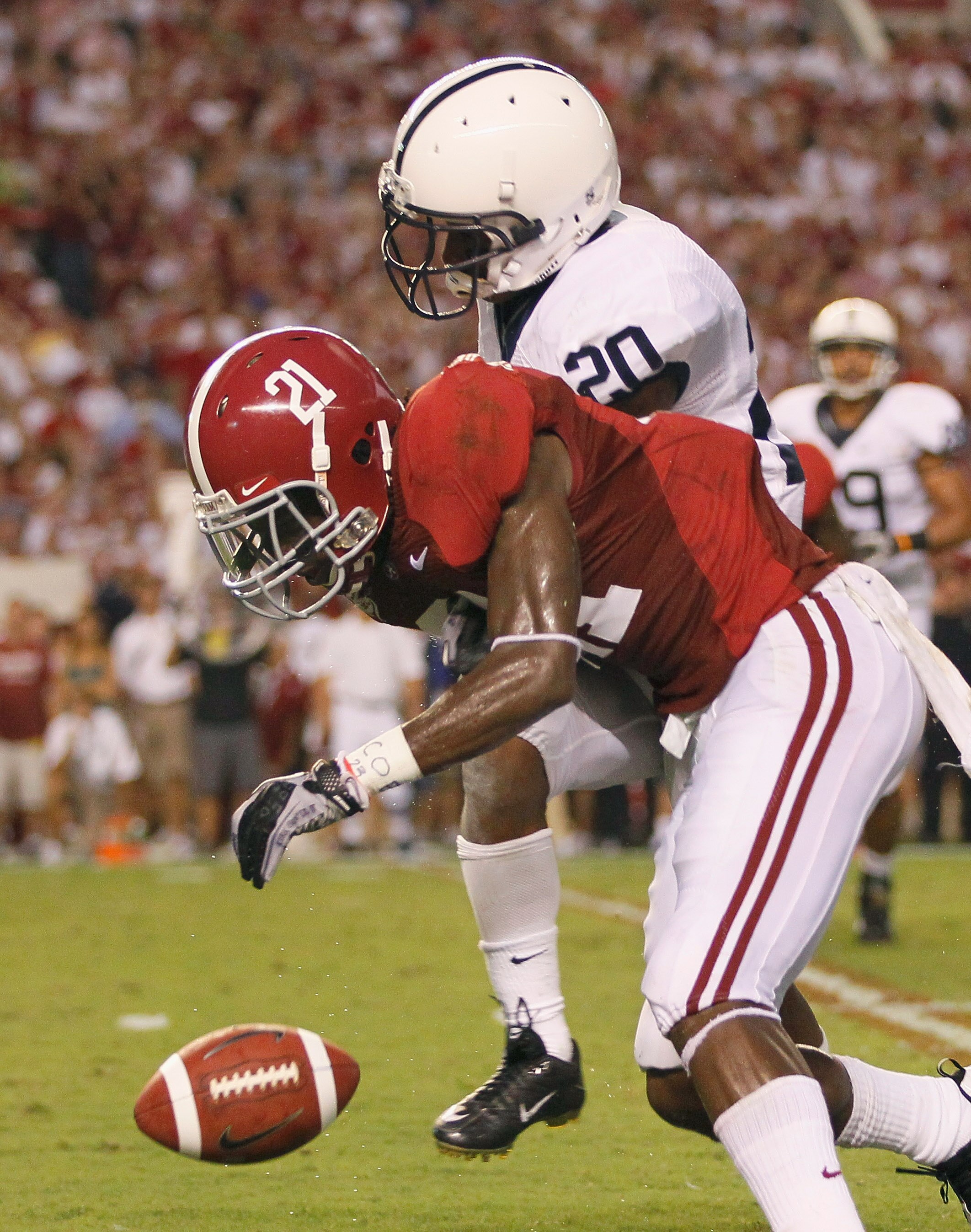 TUSCALOOSA, AL - SEPTEMBER 11: Dre Kirkpatrick #21 of the Alabama Crimson Tide breaks up a pass intended for Devon Smith #20 of the Penn State Nittany Lions at Bryant-Denny Stadium on September 11, 2010 in Tuscaloosa, Alabama. (Photo by Kevin C. Cox/Get TUSCALOOSA, AL - SEPTEMBER 11: Dre Kirkpatrick #21 of the Alabama Crimson Tide breaks up a pass intended for Devon Smith #20 of the Penn State Nittany Lions at Bryant-Denny Stadium on September 11, 2010 in Tuscaloosa, Alabama. (Photo by Kevin C. Cox/Get