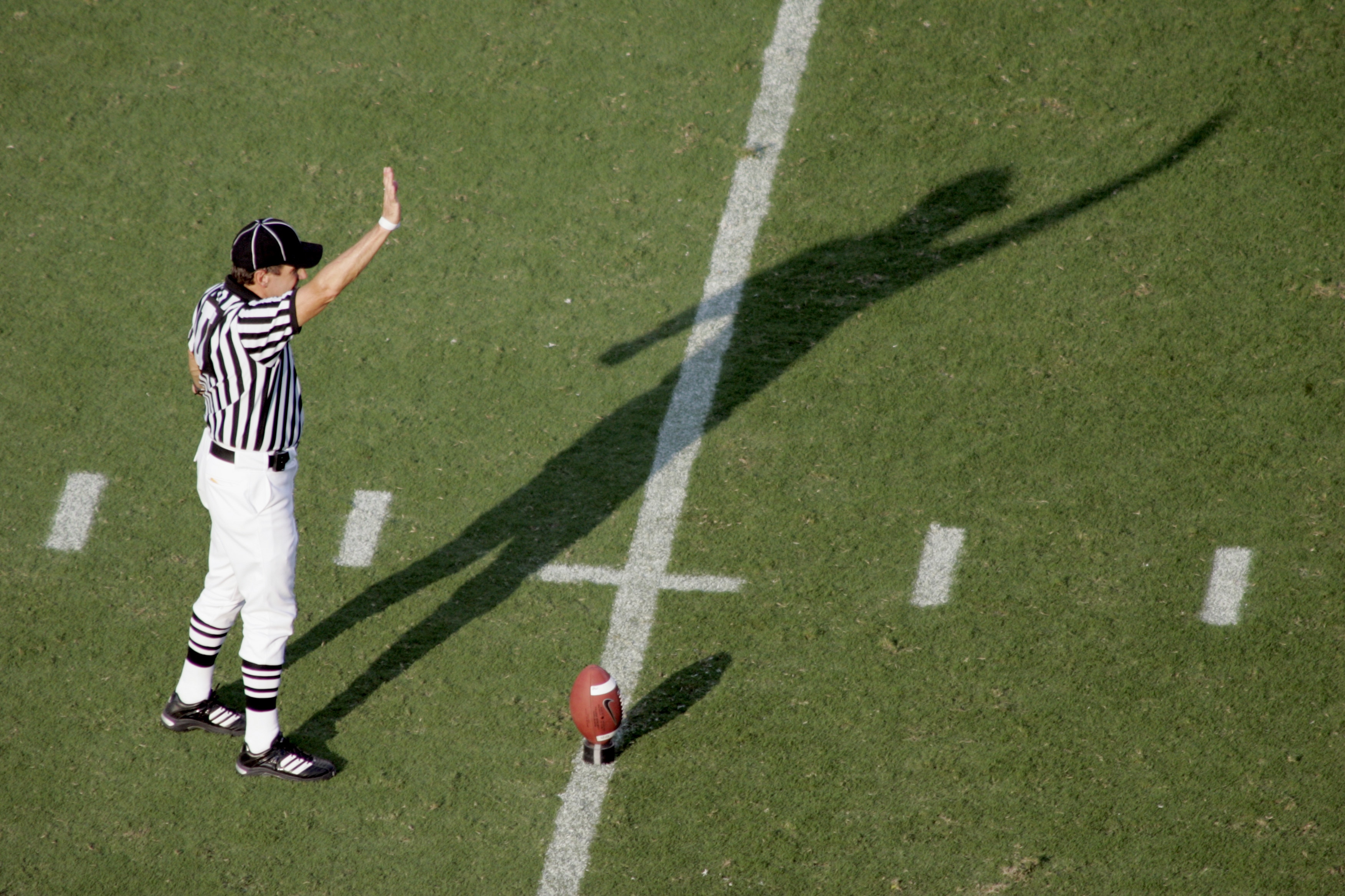 COLUMBIA, SC - SEPTEMBER 17: An official prepares for the kick-off during the game between the University of South Carolina Gamecocks and the University of Alabama Crimson Tide on September 17, 2005, at Williams-Brice Stadium in Columbia, South Carolina. COLUMBIA, SC - SEPTEMBER 17: An official prepares for the kick-off during the game between the University of South Carolina Gamecocks and the University of Alabama Crimson Tide on September 17, 2005, at Williams-Brice Stadium in Columbia, South Carolina.