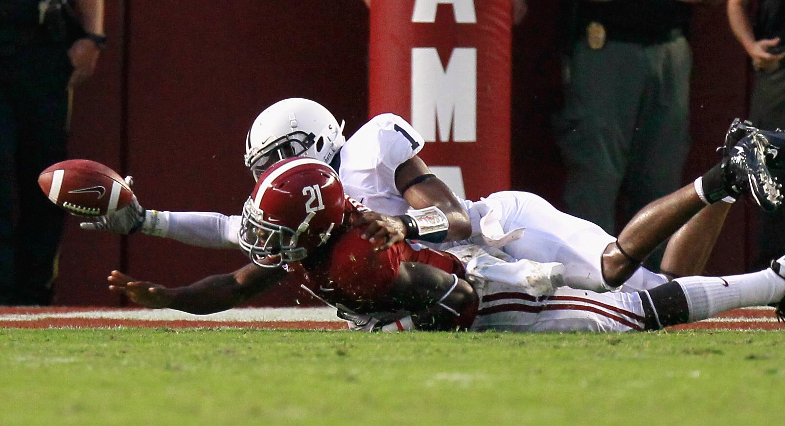 TUSCALOOSA, AL - SEPTEMBER 11: Quarterback Robert Bolden #1 of the Penn State Nittany Lions forces a fumble by Dre Kirkpatrick #21 of the Alabama Crimson Tide at Bryant-Denny Stadium on September 11, 2010 in Tuscaloosa, Alabama. (Photo by Kevin C. Cox/G TUSCALOOSA, AL - SEPTEMBER 11: Quarterback Robert Bolden #1 of the Penn State Nittany Lions forces a fumble by Dre Kirkpatrick #21 of the Alabama Crimson Tide at Bryant-Denny Stadium on September 11, 2010 in Tuscaloosa, Alabama. (Photo by Kevin C. Cox/G