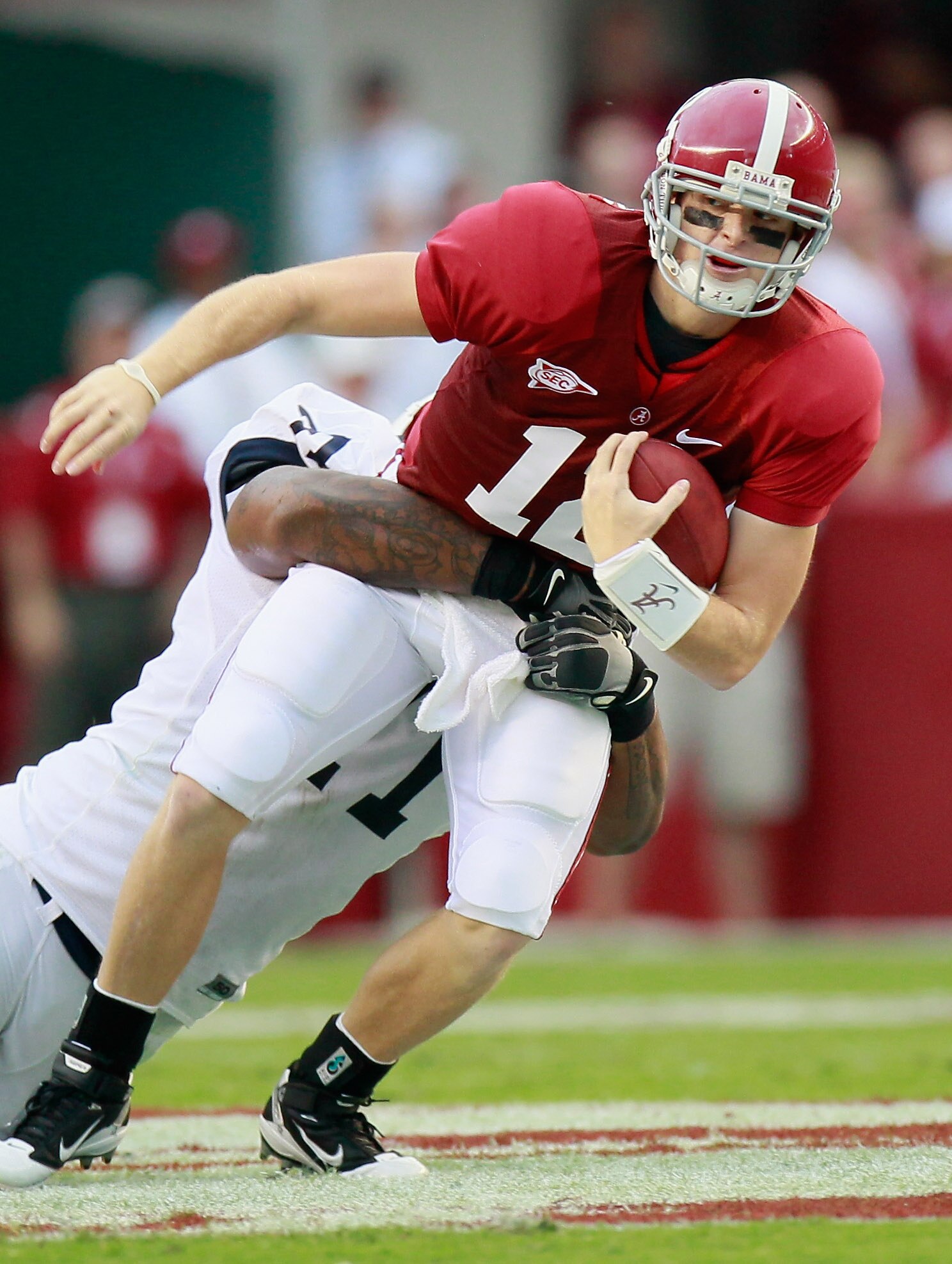 TUSCALOOSA, AL - SEPTEMBER 11: Quarterback Greg McElroy #12 of the Alabama Crimson Tide is sacked by Devon Still #71 of the Penn State Nittany Lions at Bryant-Denny Stadium on September 11, 2010 in Tuscaloosa, Alabama. (Photo by Kevin C. Cox/Getty Image TUSCALOOSA, AL - SEPTEMBER 11: Quarterback Greg McElroy #12 of the Alabama Crimson Tide is sacked by Devon Still #71 of the Penn State Nittany Lions at Bryant-Denny Stadium on September 11, 2010 in Tuscaloosa, Alabama. (Photo by Kevin C. Cox/Getty Image