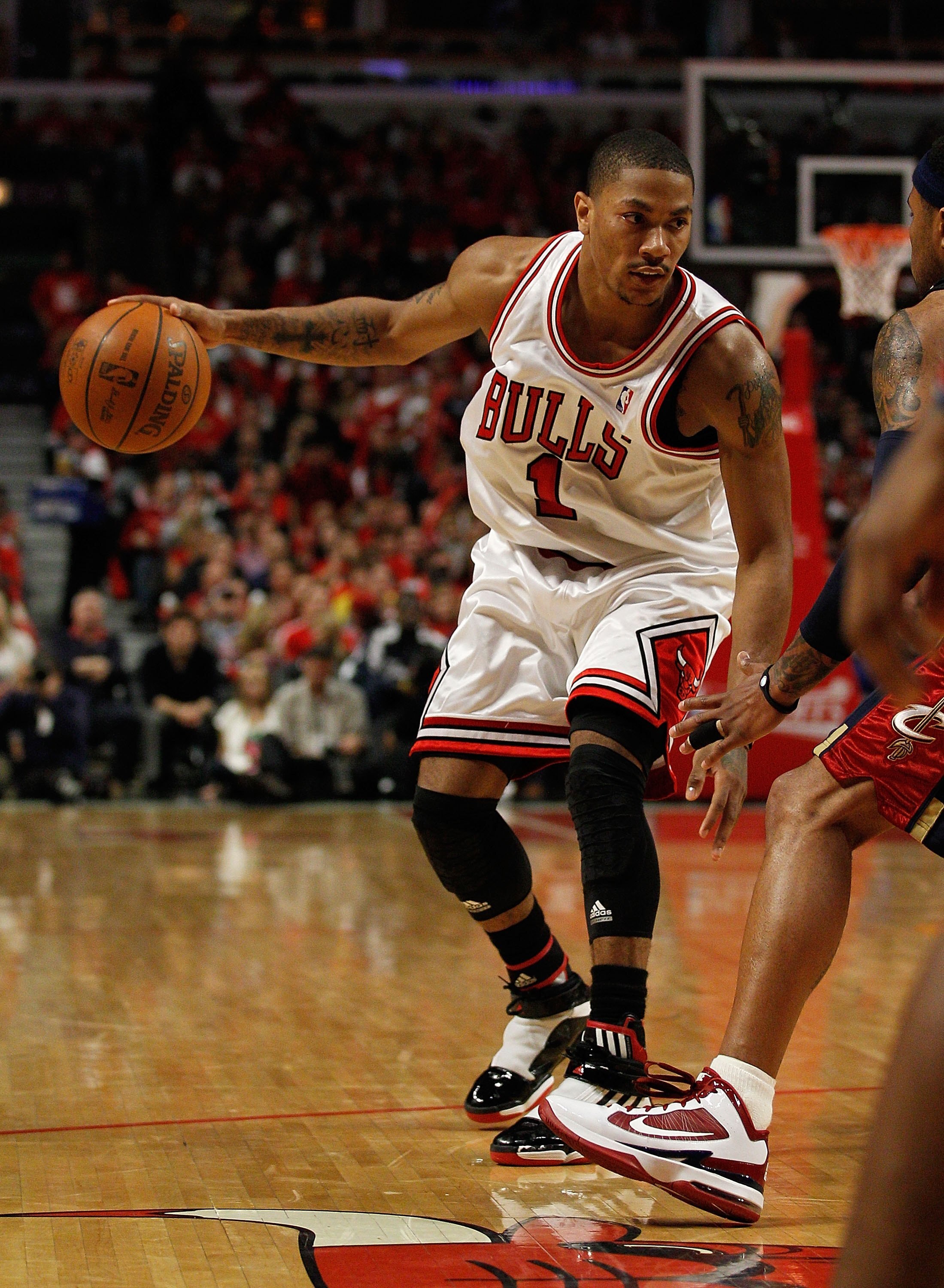 CHICAGO - APRIL 22: Derrick Rose #1 of the Chicago Bulls moves against the Cleveland Cavaliers in Game Three of the Eastern Conference Quarterfinals during the 2010 NBA Playoffs at the United Center on April 22, 2010 in Chicago, Illinois. The Bulls defeat
