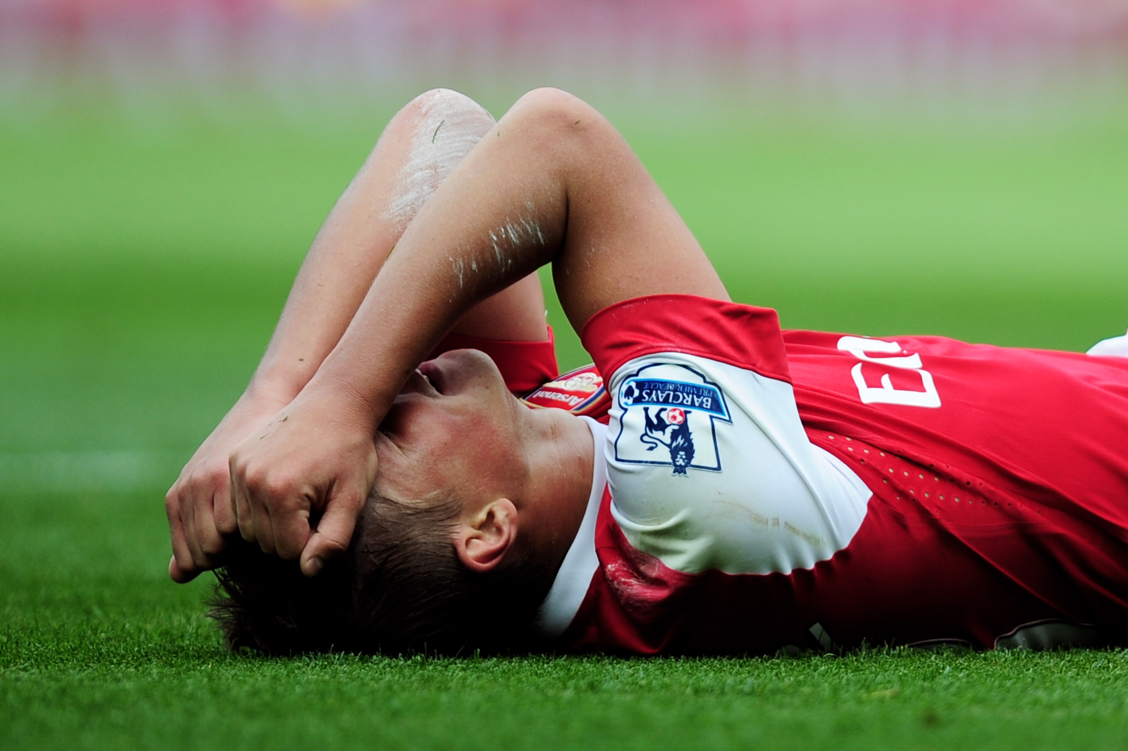 LONDON, ENGLAND - SEPTEMBER 11: Andrei Arshavin of Arsenal holds his head after a missed chance during the Barclays Premier League match between Arsenal and Bolton Wanderers at The Emirates Stadium on September 11, 2010 in London, England. (Photo by Jam LONDON, ENGLAND - SEPTEMBER 11: Andrei Arshavin of Arsenal holds his head after a missed chance during the Barclays Premier League match between Arsenal and Bolton Wanderers at The Emirates Stadium on September 11, 2010 in London, England. (Photo by Jam