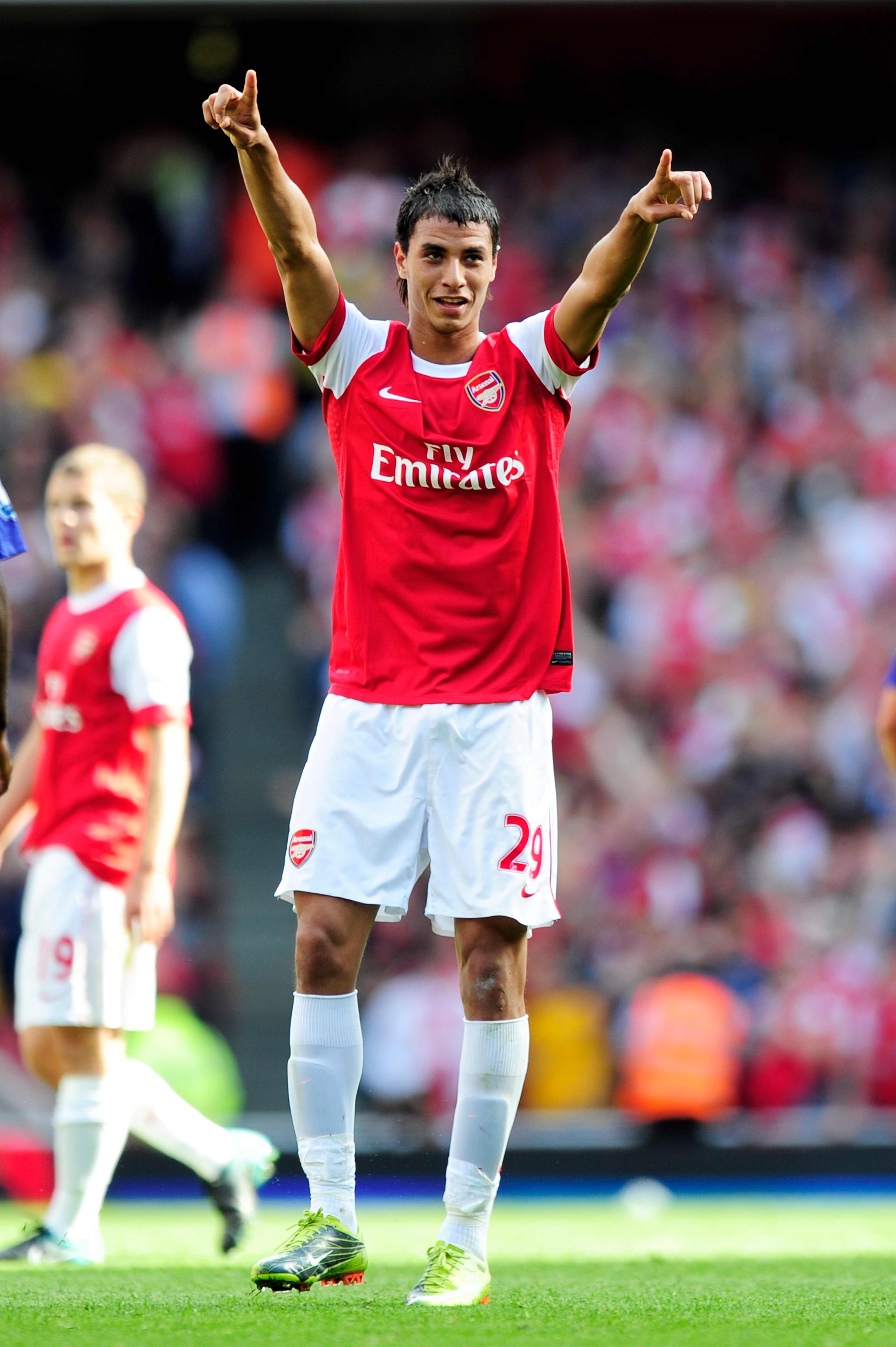 LONDON, ENGLAND - SEPTEMBER 11: Marouane Chamakh of Arsenal celebrates after he scores his teams second goal during the Barclays Premier League match between Arsenal and Bolton Wanderers at The Emirates Stadium on September 11, 2010 in London, England. LONDON, ENGLAND - SEPTEMBER 11: Marouane Chamakh of Arsenal celebrates after he scores his teams second goal during the Barclays Premier League match between Arsenal and Bolton Wanderers at The Emirates Stadium on September 11, 2010 in London, England.