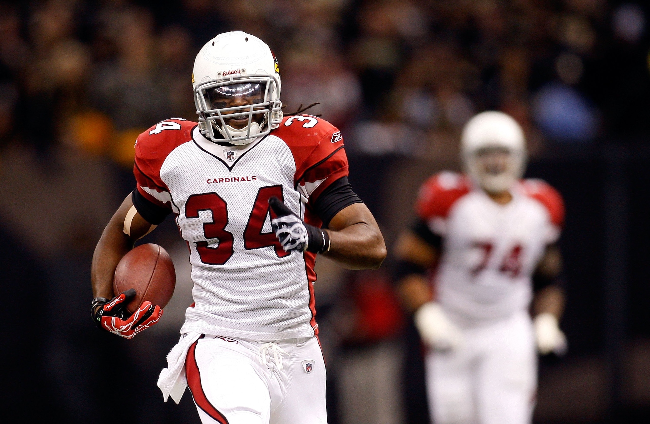 NEW ORLEANS - JANUARY 16:  Tim Hightower #34 of the Arizona Cardinals scores a 70-yard rushing touchdown in the first quarter against the New Orleans Saints during the NFC Divisional Playoff Game at Louisana Superdome on January 16, 2010 in New Orleans, L