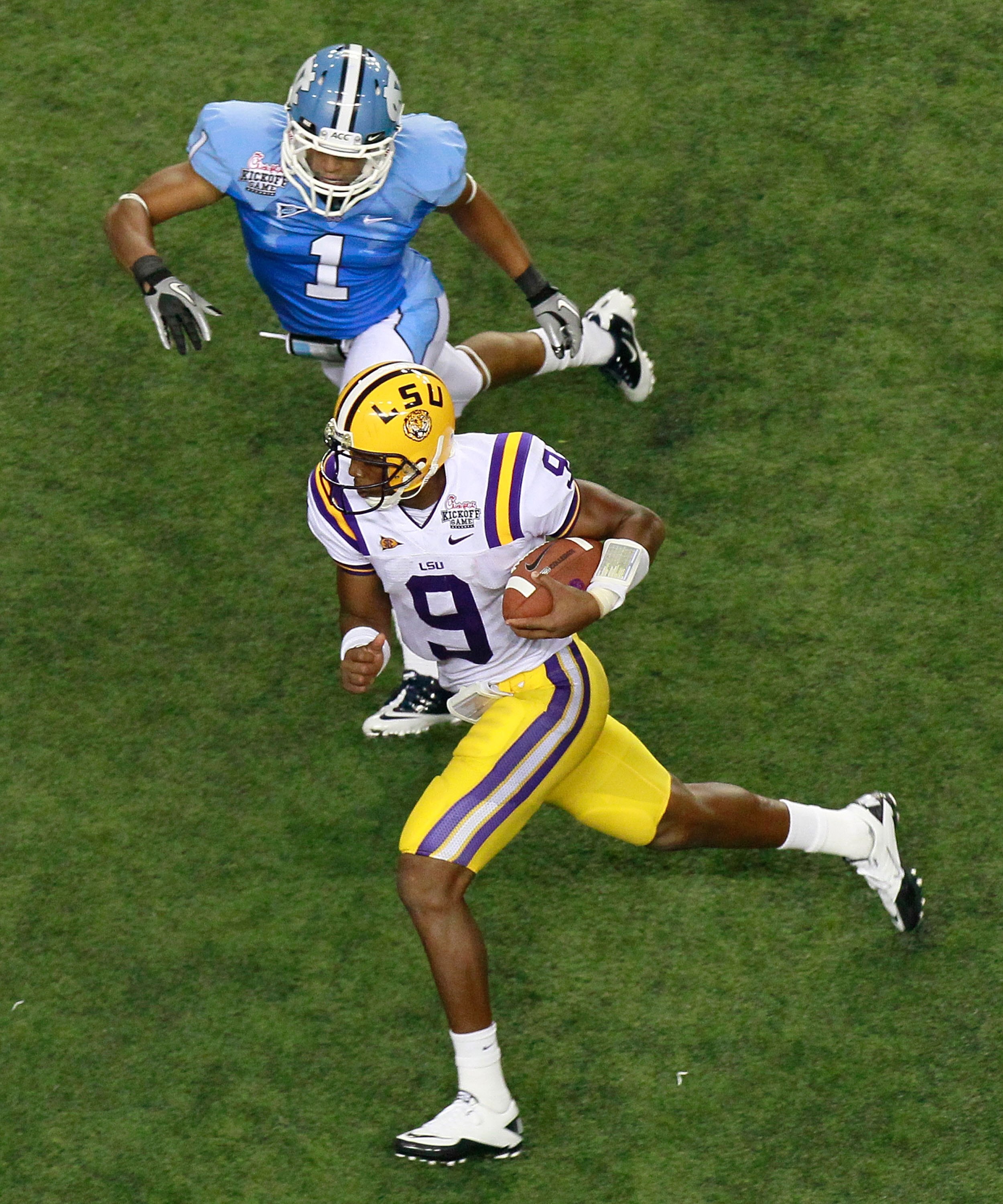 ATLANTA - SEPTEMBER 04: Quarterback Jordan Jefferson #9 of the LSU Tigers against Gene Robinson #1 of the North Carolina Tar Heels during the Chick-fil-A Kickoff Game at Georgia Dome on September 4, 2010 in Atlanta, Georgia. (Photo by Kevin C. Cox/Getty ATLANTA - SEPTEMBER 04: Quarterback Jordan Jefferson #9 of the LSU Tigers against Gene Robinson #1 of the North Carolina Tar Heels during the Chick-fil-A Kickoff Game at Georgia Dome on September 4, 2010 in Atlanta, Georgia. (Photo by Kevin C. Cox/Getty