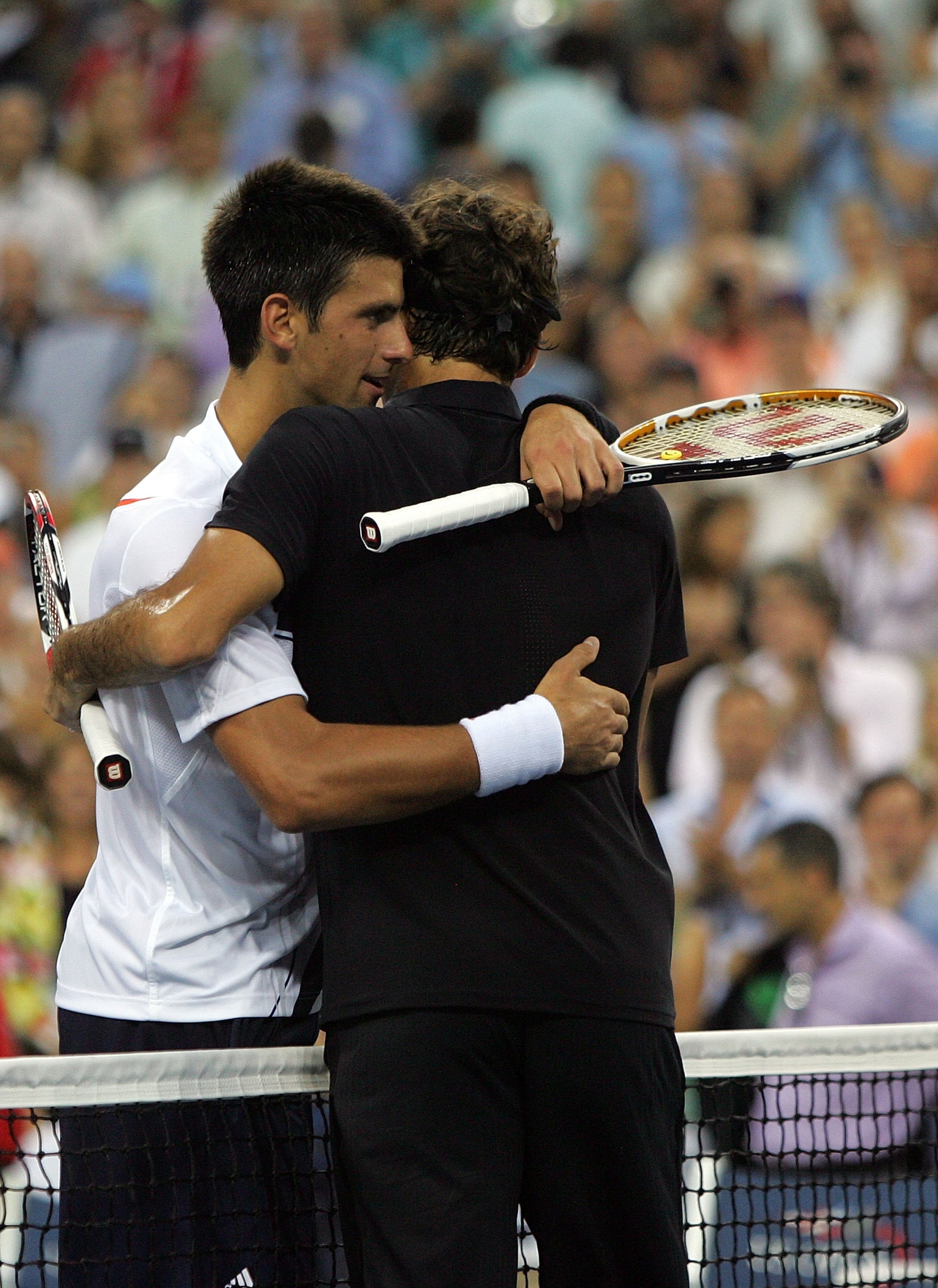 NEW YORK - SEPTEMBER 09: Roger Federer of Switzerland greets Novak Djokovic of Serbia after defeating him by a score of 7-6(4), 7-6(2), 6-4 to win the Men's Singles Final on day fourteen of the 2007 U.S. Open in Arthur Ashe Stadium at the Billie Jean Kin NEW YORK - SEPTEMBER 09: Roger Federer of Switzerland greets Novak Djokovic of Serbia after defeating him by a score of 7-6(4), 7-6(2), 6-4 to win the Men's Singles Final on day fourteen of the 2007 U.S. Open in Arthur Ashe Stadium at the Billie Jean Kin