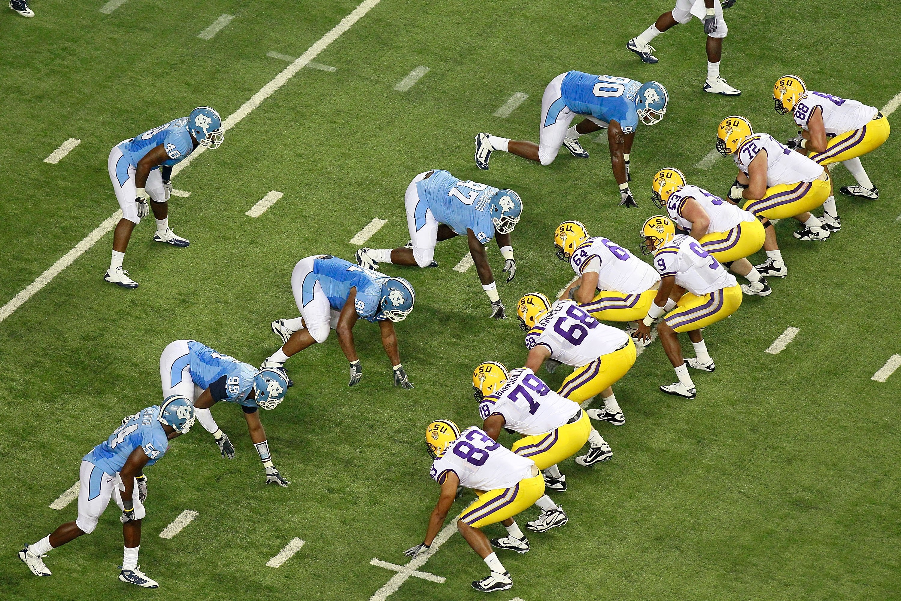 ATLANTA - SEPTEMBER 04: The offense of the LSU Tigers faces the defense of the North Carolina Tar Heels during the Chick-fil-A Kickoff Game at Georgia Dome on September 4, 2010 in Atlanta, Georgia. (Photo by Kevin C. Cox/Getty Images) ATLANTA - SEPTEMBER 04: The offense of the LSU Tigers faces the defense of the North Carolina Tar Heels during the Chick-fil-A Kickoff Game at Georgia Dome on September 4, 2010 in Atlanta, Georgia. (Photo by Kevin C. Cox/Getty Images)