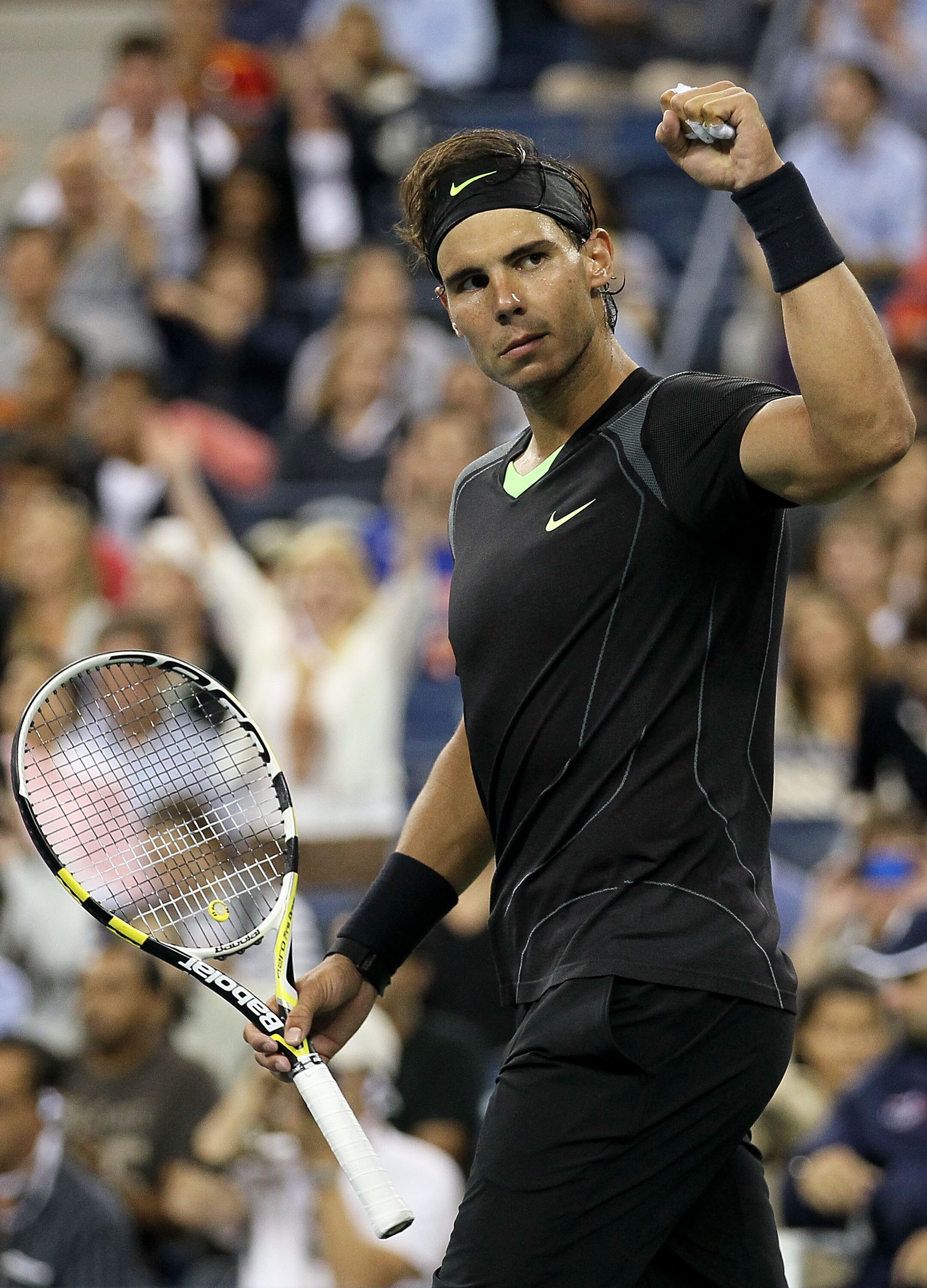 NEW YORK - SEPTEMBER 07: Rafael Nadal of Spain celebrates after he won match point against Feliciano Lopez of Spain during his men's singles match on day nine of the 2010 U.S. Open at the USTA Billie Jean King National Tennis Center on September 7, 2010 NEW YORK - SEPTEMBER 07: Rafael Nadal of Spain celebrates after he won match point against Feliciano Lopez of Spain during his men's singles match on day nine of the 2010 U.S. Open at the USTA Billie Jean King National Tennis Center on September 7, 2010