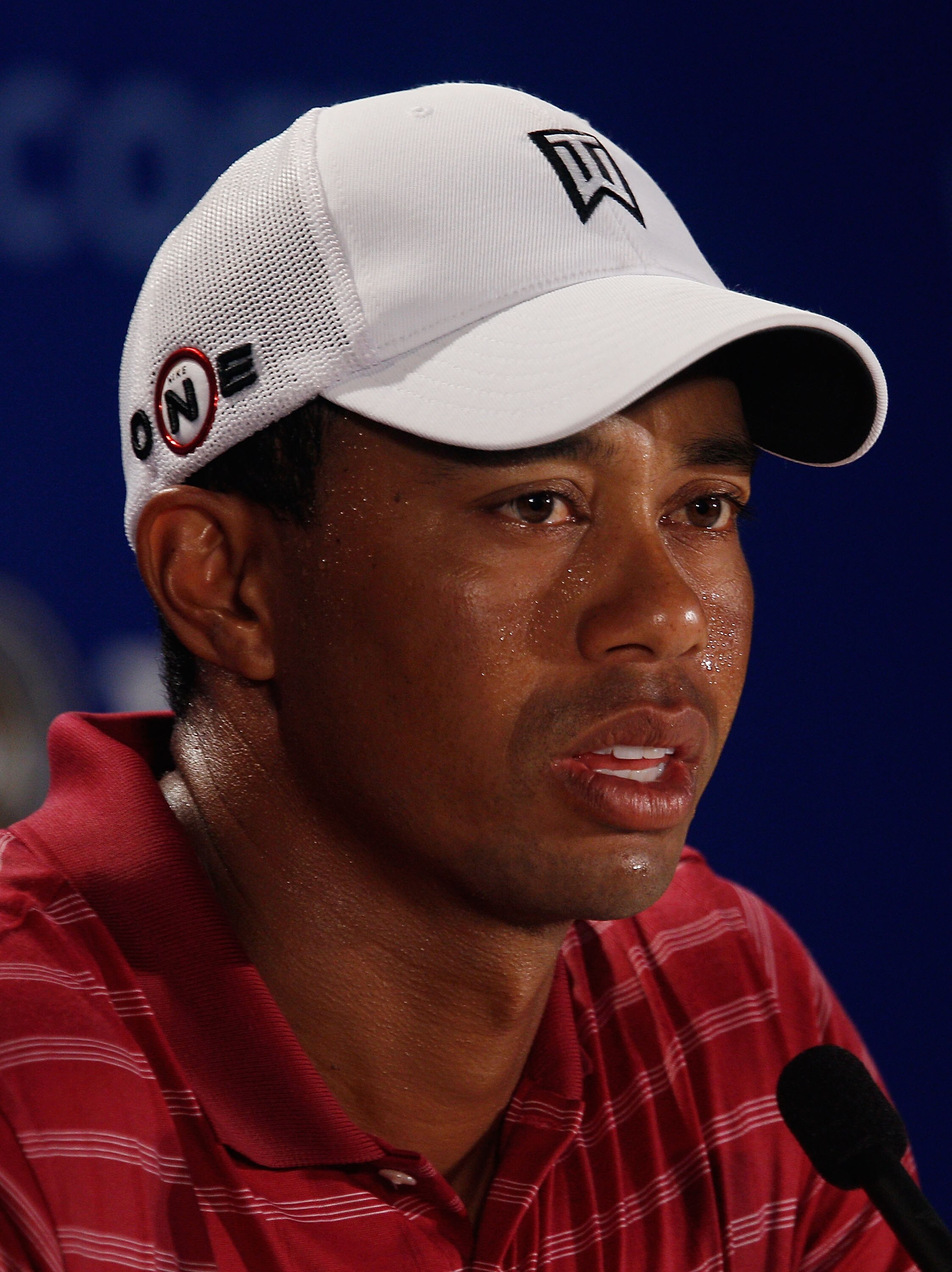 KOHLER, WI - AUGUST 10:  Tiger Woods is interviewed during a press conference prior to the start of the 92nd PGA Championship on the Straits Course at Whistling Straits on August 10, 2010 in Kohler, Wisconsin.  (Photo by Scott Halleran/Getty Images)