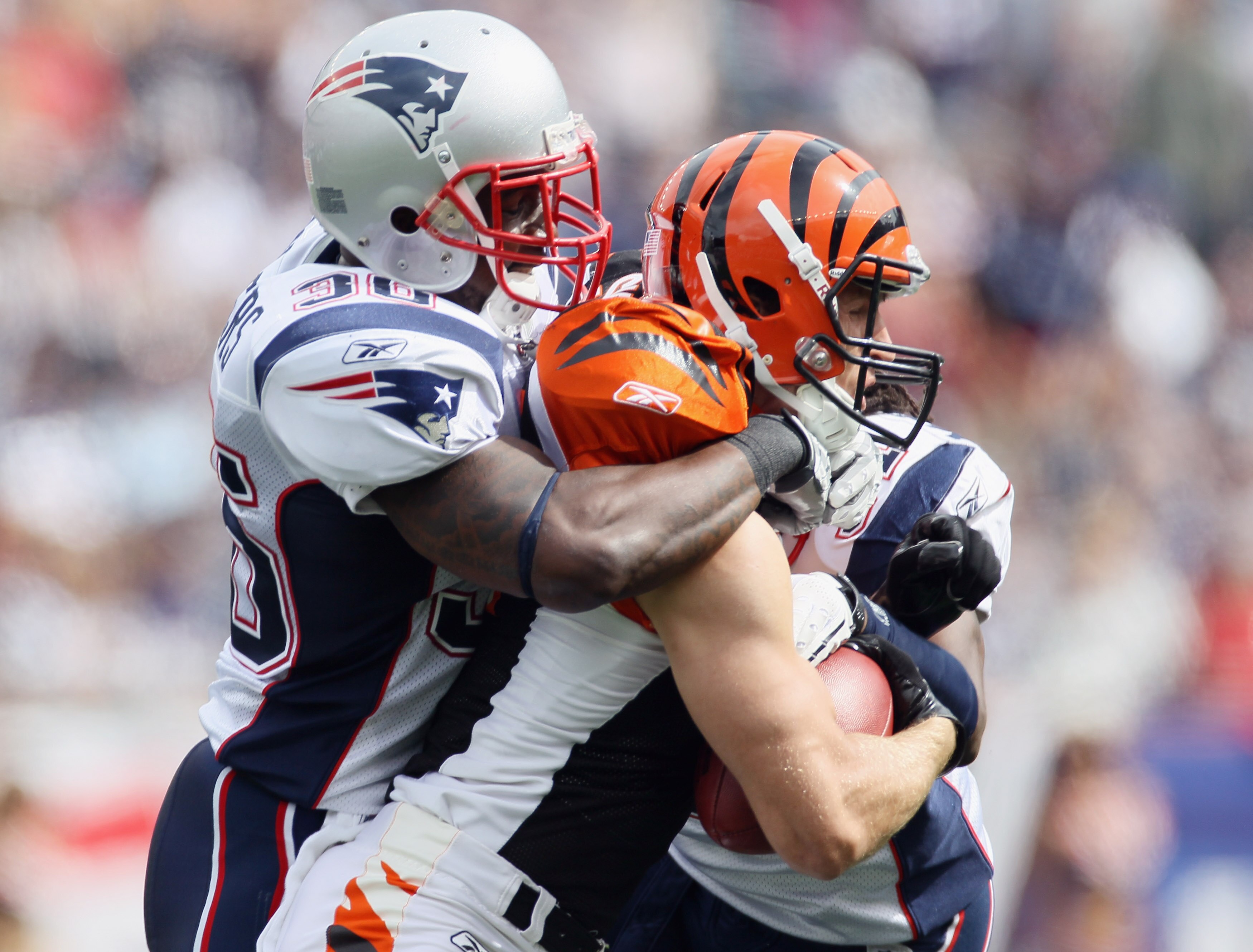 FOXBORO, MA - SEPTEMBER 12:  Jordan Shipley #11 of the Cincinnati Bengals is tackled by James Sanders #26 of the New England Patriots during the NFL season opener on September 12, 2010 at Gillette Stadium in Foxboro, Massachusetts.  (Photo by Elsa/Getty I