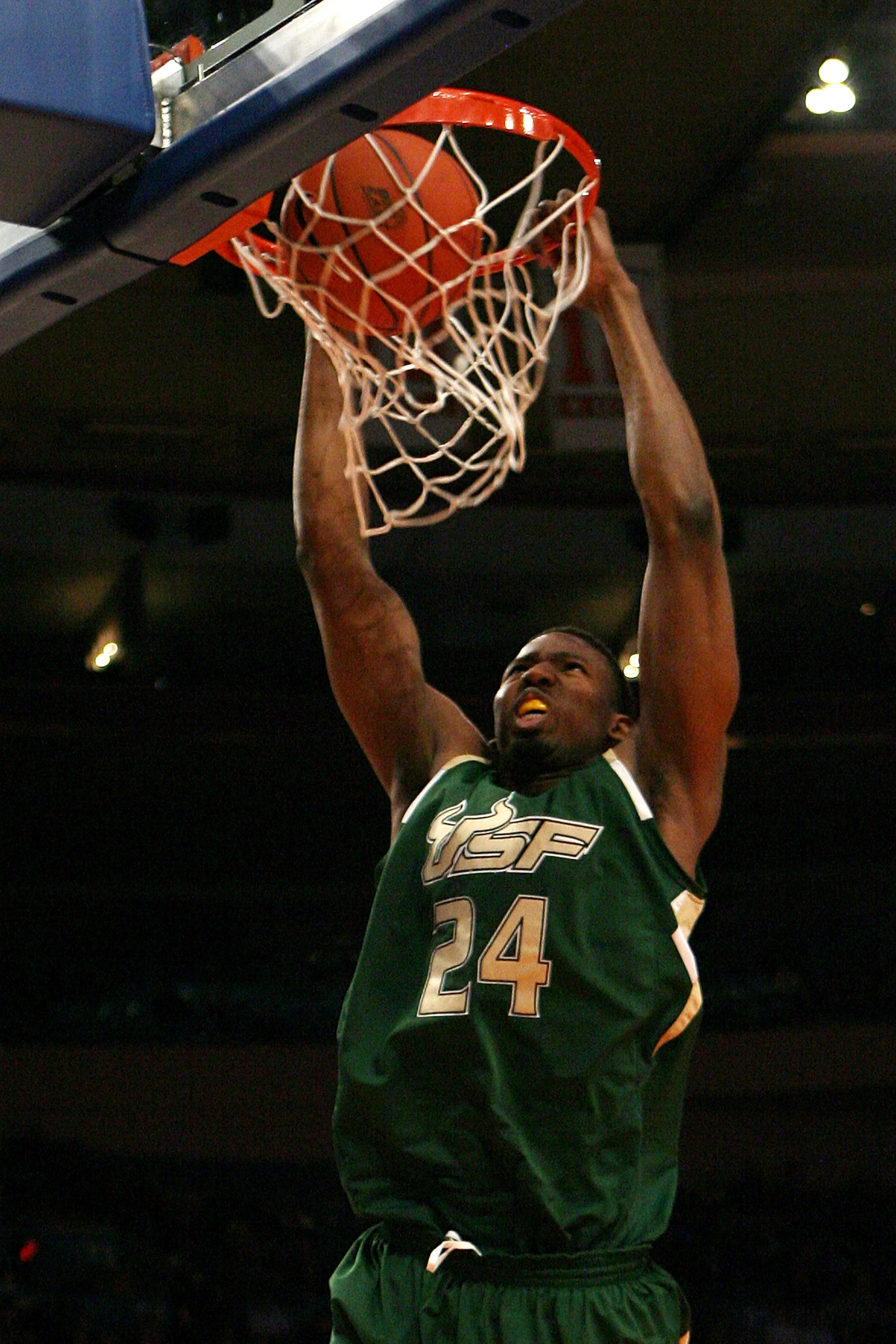 NEW YORK - MARCH 10:  Augustus Gilchrist #24 of the USF Bulls dunks the ball against the Georgetown Hoyas during the second round of 2010 NCAA Big East Tournament at Madison Square Garden on March 10, 2010 in New York City.  (Photo by Chris Trotman/Getty