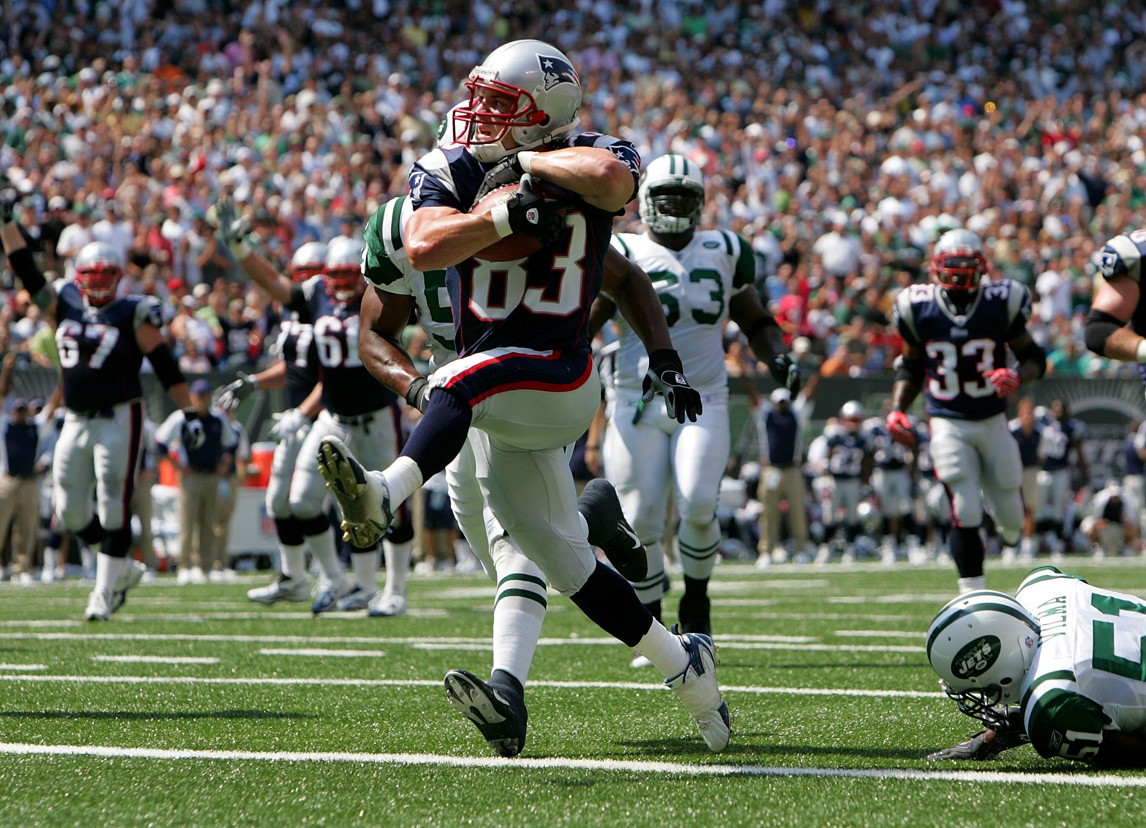 EAST RUTHERFORD, NJ - SEPTEMBER 09: Wes Welker #83 of the New England Patriots runs in a touchdown in the first quarter agaisnt the New York Jets on September 9, 2007 at Giants Stadium in East Rutherford, New Jersey. (Photo by Nick Laham/Getty Images) EAST RUTHERFORD, NJ - SEPTEMBER 09: Wes Welker #83 of the New England Patriots runs in a touchdown in the first quarter agaisnt the New York Jets on September 9, 2007 at Giants Stadium in East Rutherford, New Jersey. (Photo by Nick Laham/Getty Images)