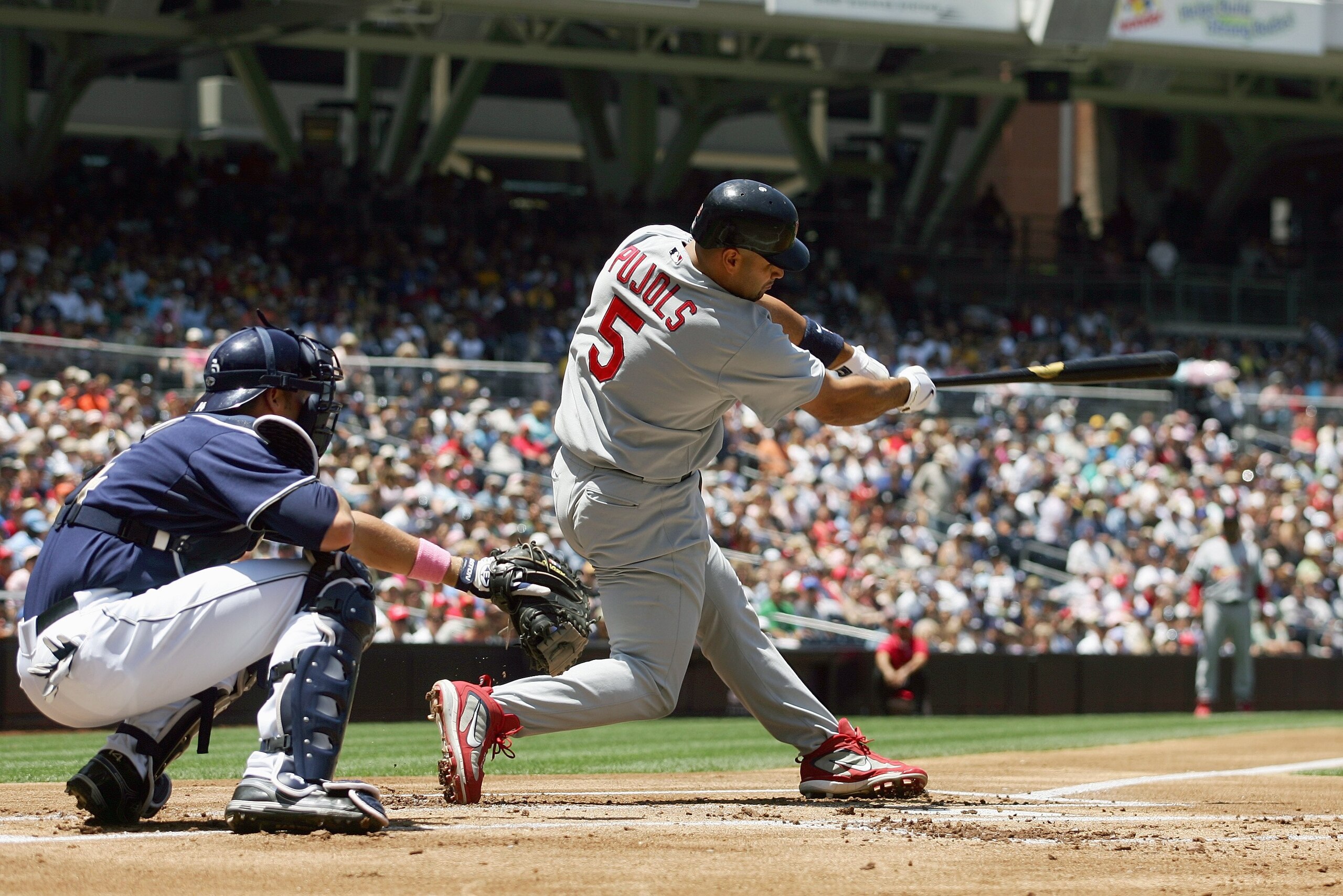 SAN DIEGO - MAY 13: Albert Pujols #5 of the St. Louis Cardinals at bat as catcher Rob Bowen #14 of the San Diego Padres looks on during their MLB game on May 13, 2007 at Petco Park in San Diego, California. (Photo by Donald Miralle/Getty Images)