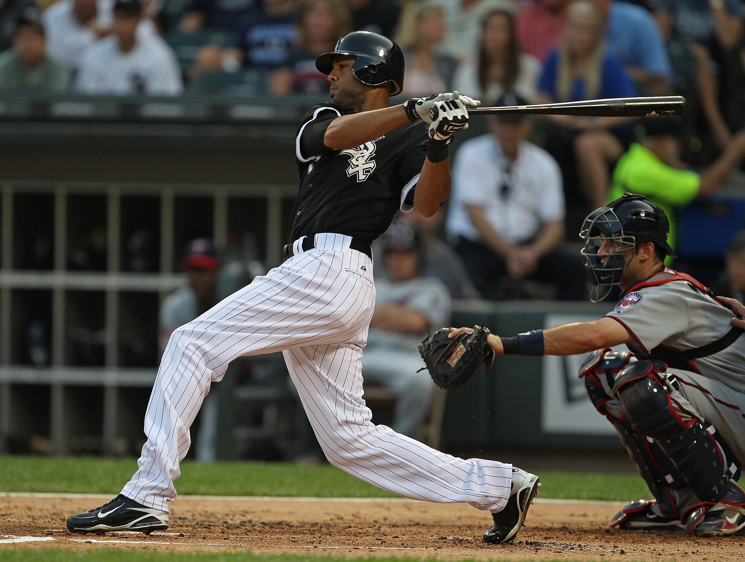 CHICAGO - AUGUST 10: Alex Rios #51 of the Chicago White Sox hits the ball against the Minnesota Twins at U.S. Cellular Field on August 10, 2010 in Chicago, Illinois. The Twins defeated the White Sox 12-6. (Photo by Jonathan Daniel/Getty Images)