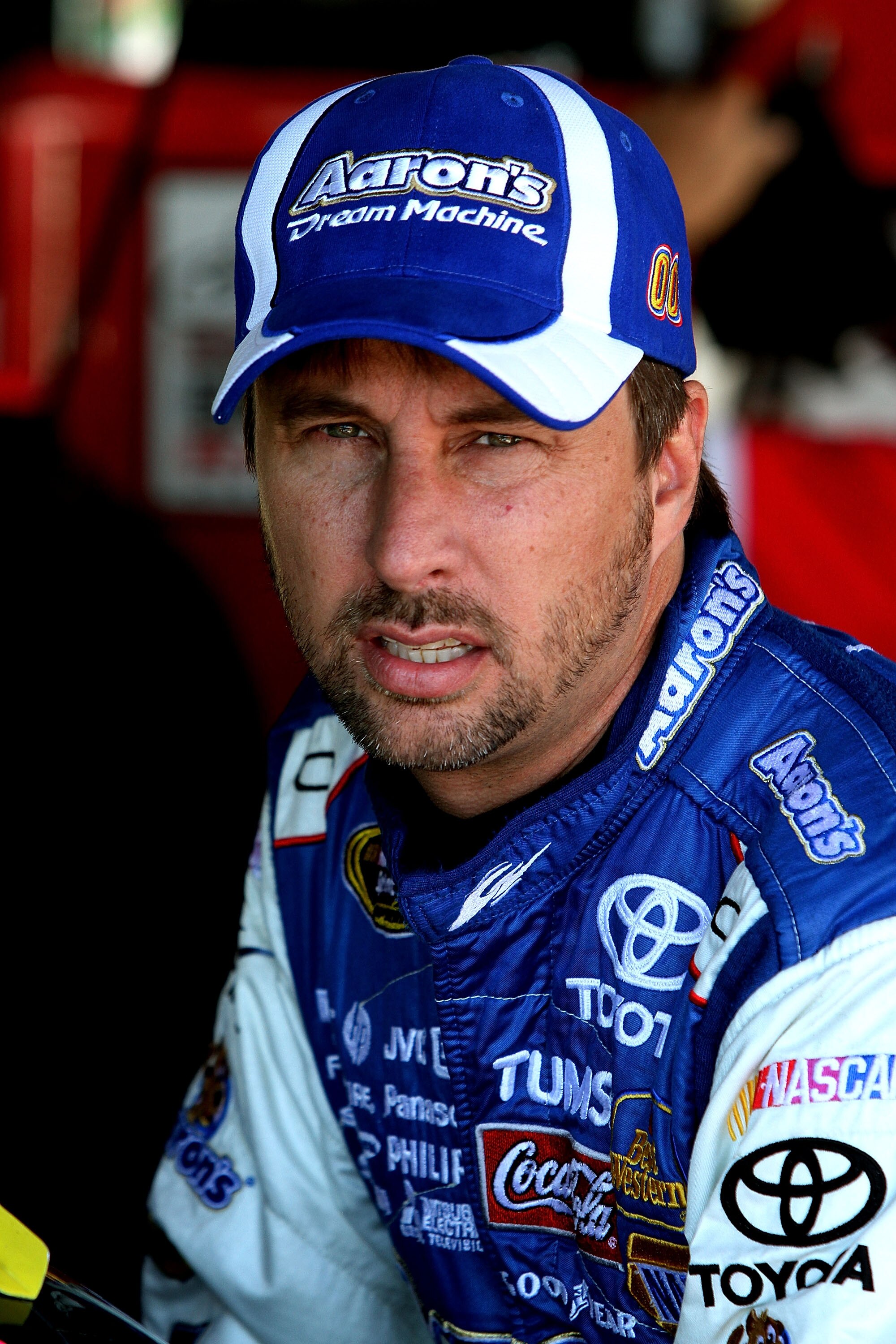 RICHMOND, VA - SEPTEMBER 10: David Reutimann, driver of the #00 Aaron's Dream Machine Toyota, waits in the garage during practice for the NASCAR Sprint Cup Series Air Guard 400 at Richmond International Raceway on September 10, 2010 in Richmond, Virginia.