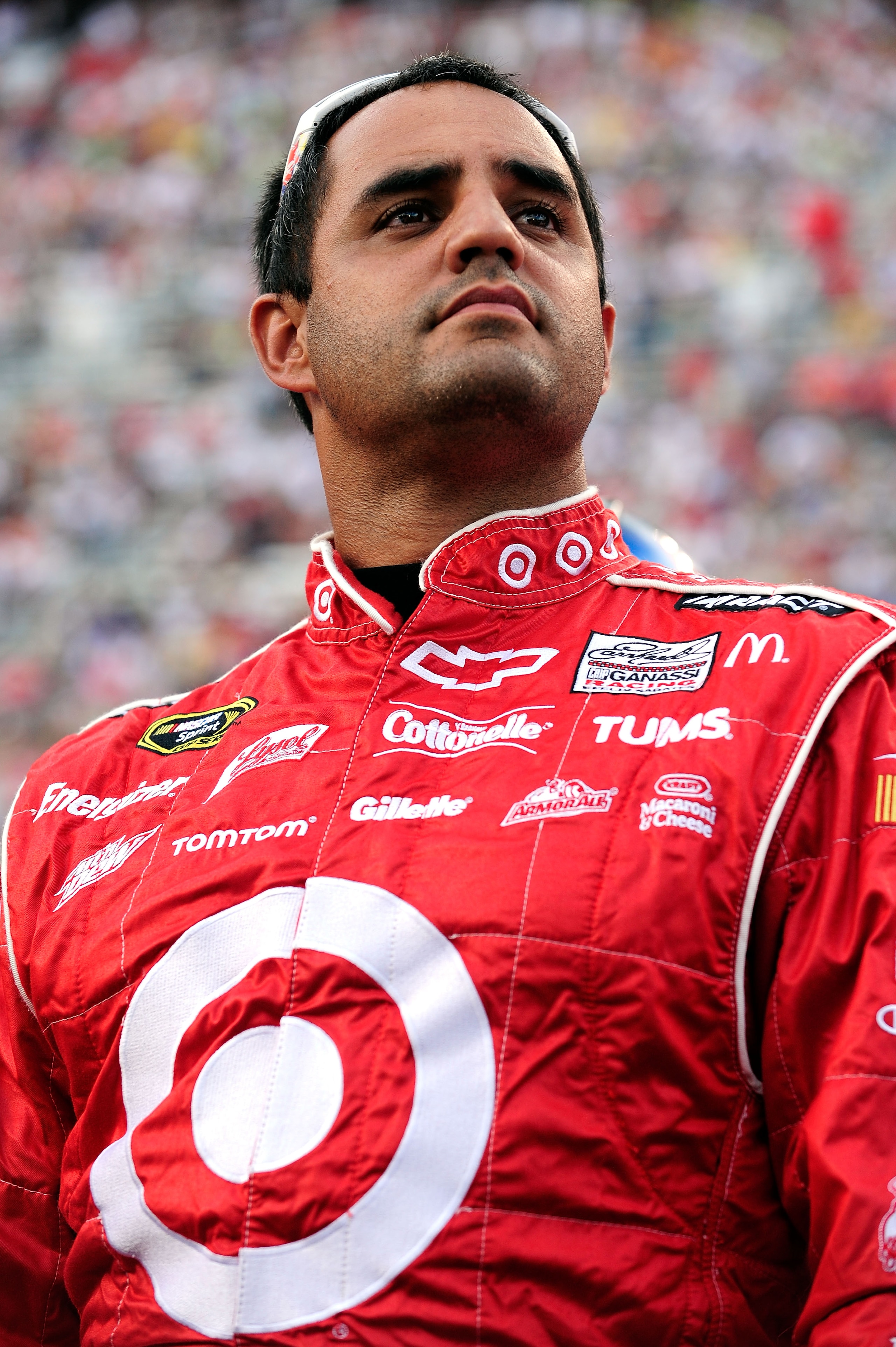 BRISTOL, TN - AUGUST 21:  Juan Pablo Montoya, driver of the #42 Target Chevrolet, stands on the grid prior to the start of the NASCAR Sprint Cup Series IRWIN Tools Night Race at Bristol Motor Speedway on August 21, 2010 in Bristol, Tennessee.  (Photo by J