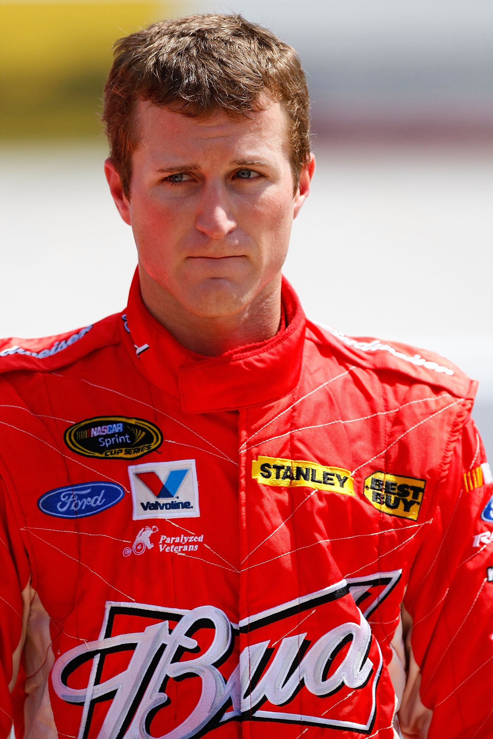 BRISTOL, TN - AUGUST 20: Kasey Kahne, driver of the #9 Budweiser Ford, stands in the garage area during practice for the NASCAR Sprint Cup Series IRWIN Tools Night Race at Bristol Motor Speedway on August 20, 2010 in Bristol, Tennessee.  (Photo by Geoff B