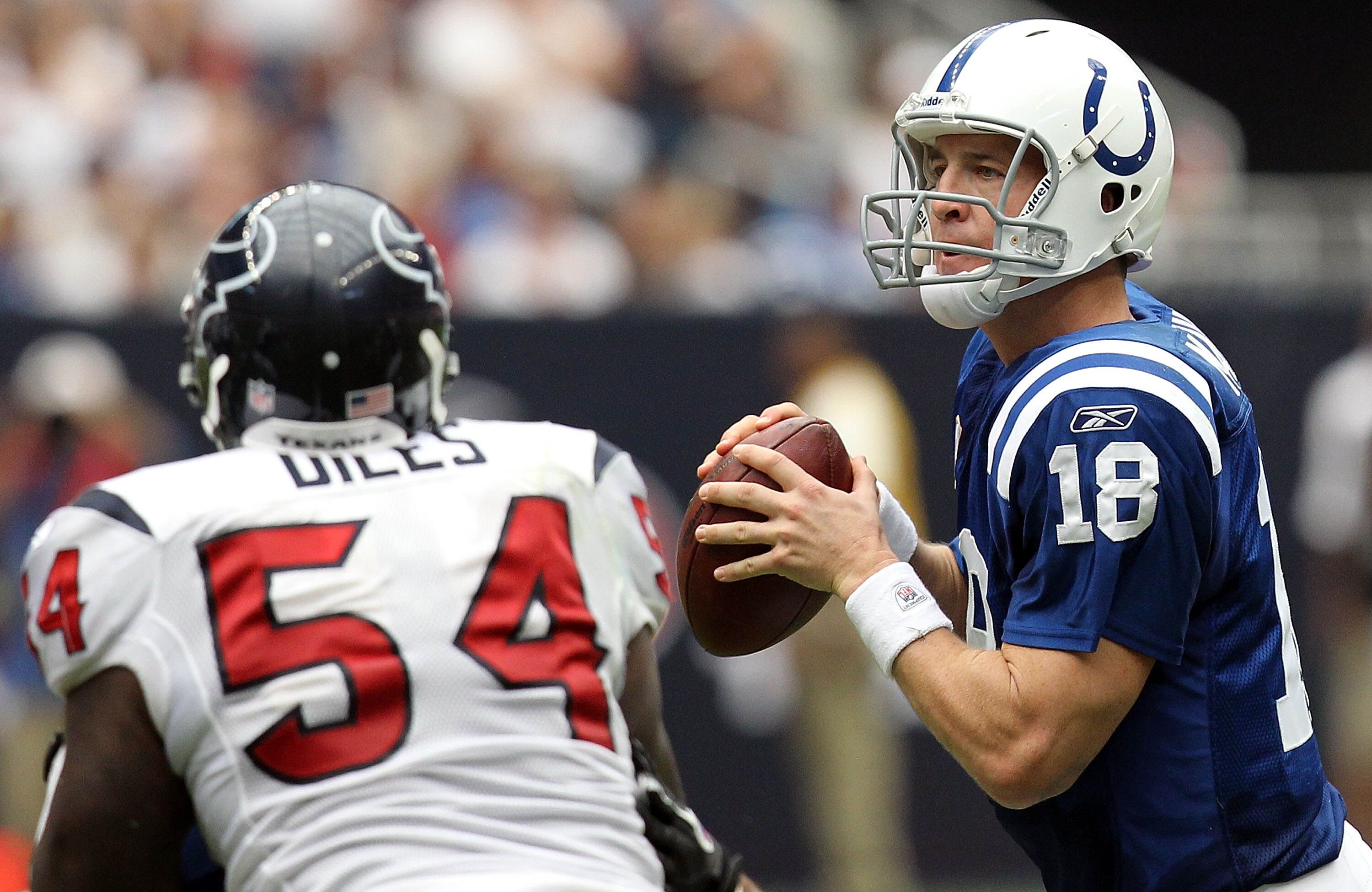 HOUSTON - SEPTEMBER 12:  Quarterback Peyton Manning #18 of the Indianapolis Colts drops back to pass against the Houston Texans during the NFL season opener at Reliant Stadium on September 12, 2010 in Houston, Texas.  (Photo by Ronald Martinez/Getty Image