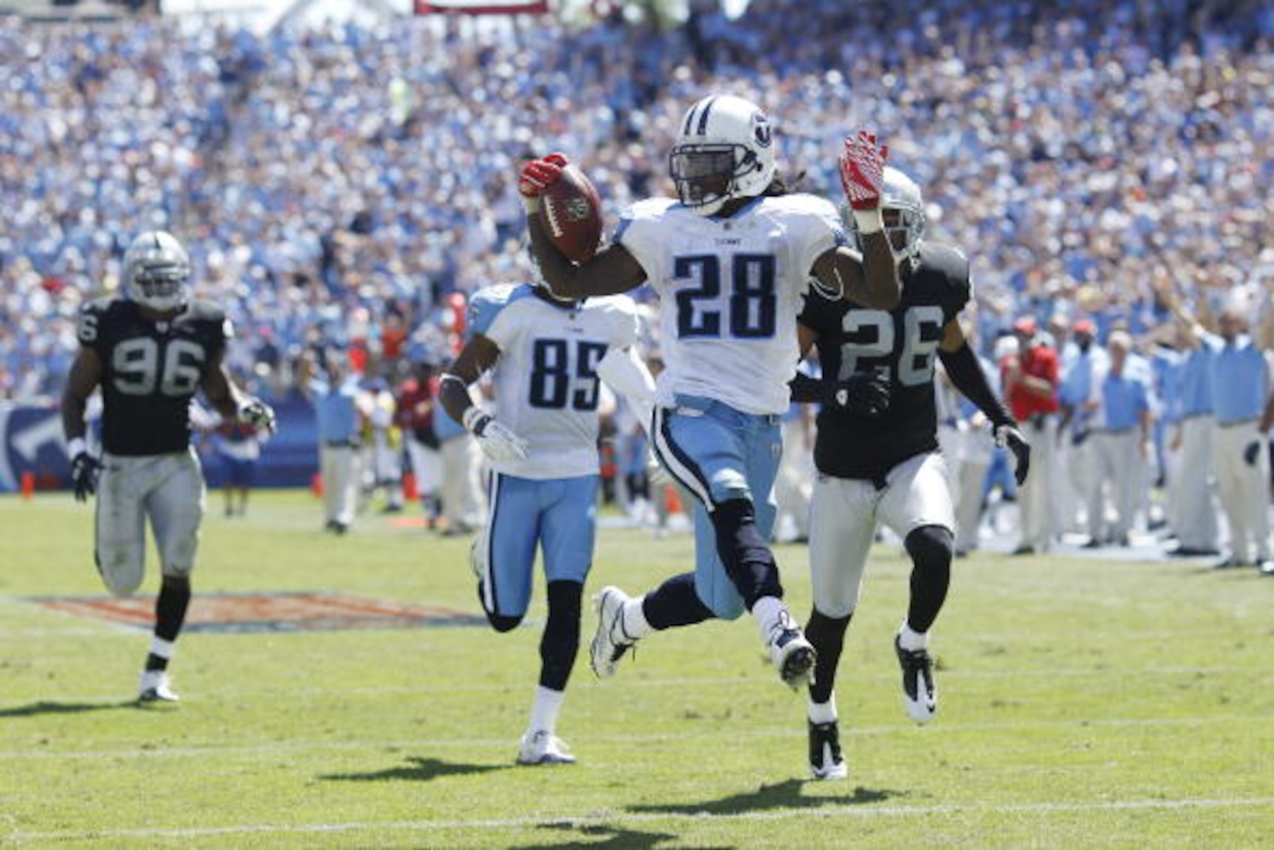 NASHVILLE - SEPTEMBER 12: Chris Johnson #28 of the Tennessee Titans runs into the end zone for a 76-yard touchdown in the first half of the NFL season opener against the Oakland Raiders at LP Field on September 12, 2010 in Nashville, Tennessee. (Photo by 