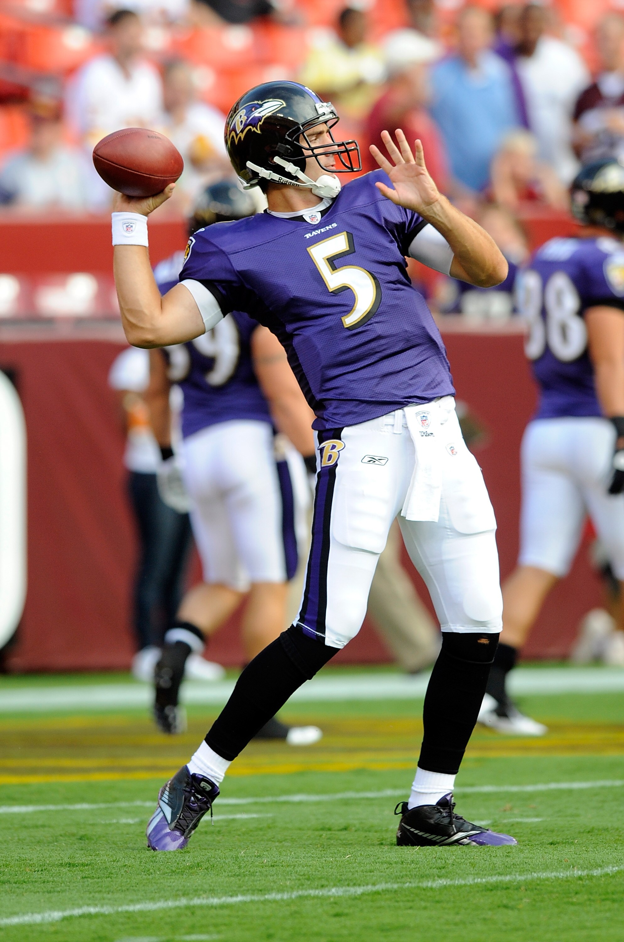 LANDOVER, MD - AUGUST 21: Joe Flacco #5 of the Baltimore Ravens warms up before the preseason game against the Washington Redskins at FedExField on August 21, 2010 in Landover, Maryland.  (Photo by Greg Fiume/Getty Images)