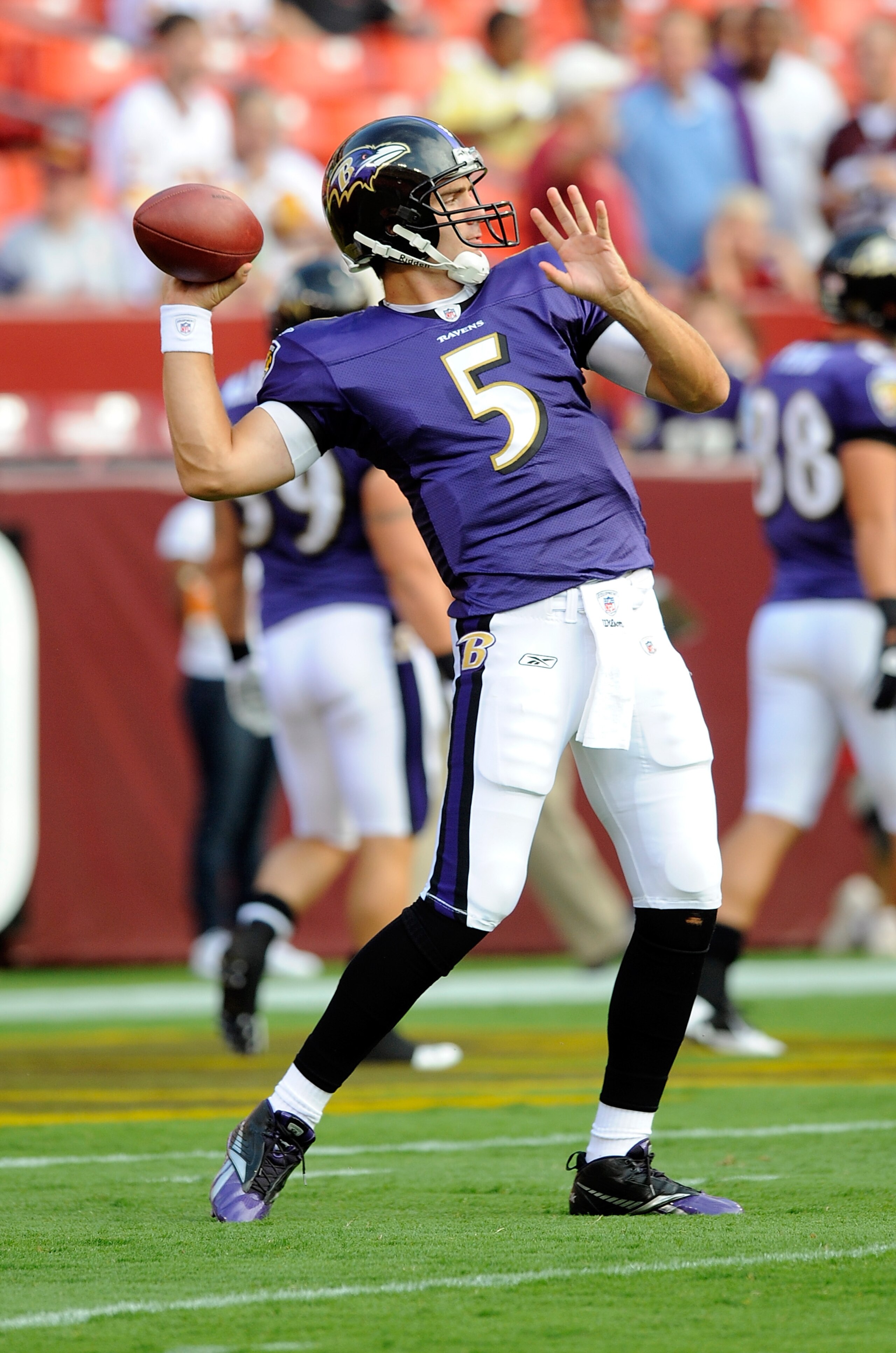 LANDOVER, MD - AUGUST 21: Joe Flacco #5 of the Baltimore Ravens warms up before the preseason game against the Washington Redskins at FedExField on August 21, 2010 in Landover, Maryland.  (Photo by Greg Fiume/Getty Images)