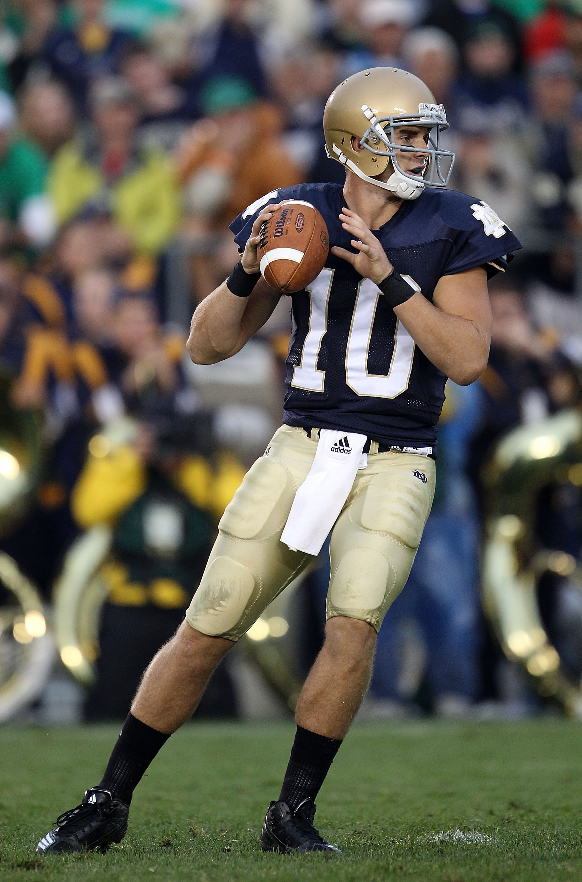SOUTH BEND, IN - SEPTEMBER 11: Dayne Crist #10 of the Notre Dame Fighting Irish looks for a receiver in the 4th quarter against the Michigan Wolverines at Notre Dame Stadium on September 11, 2010 in South Bend, Indiana. Michigan defeated Notre Dame 28-24.