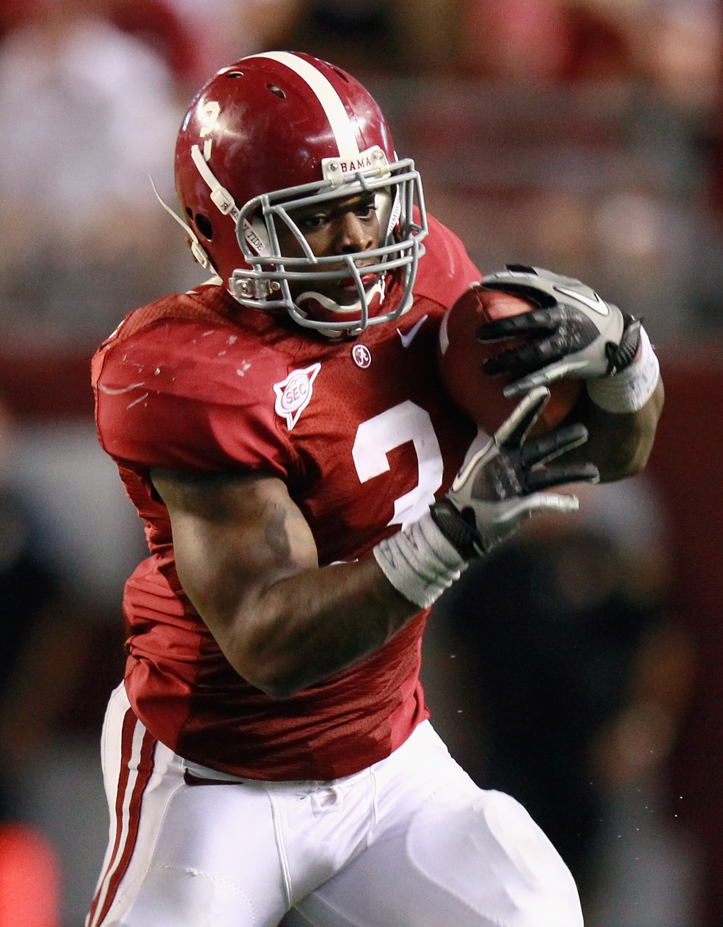 TUSCALOOSA, AL - SEPTEMBER 11:  Trent Richardson #3 of the Alabama Crimson Tide rushes against the Penn State Nittany Lions at Bryant-Denny Stadium on September 11, 2010 in Tuscaloosa, Alabama.  (Photo by Kevin C. Cox/Getty Images)