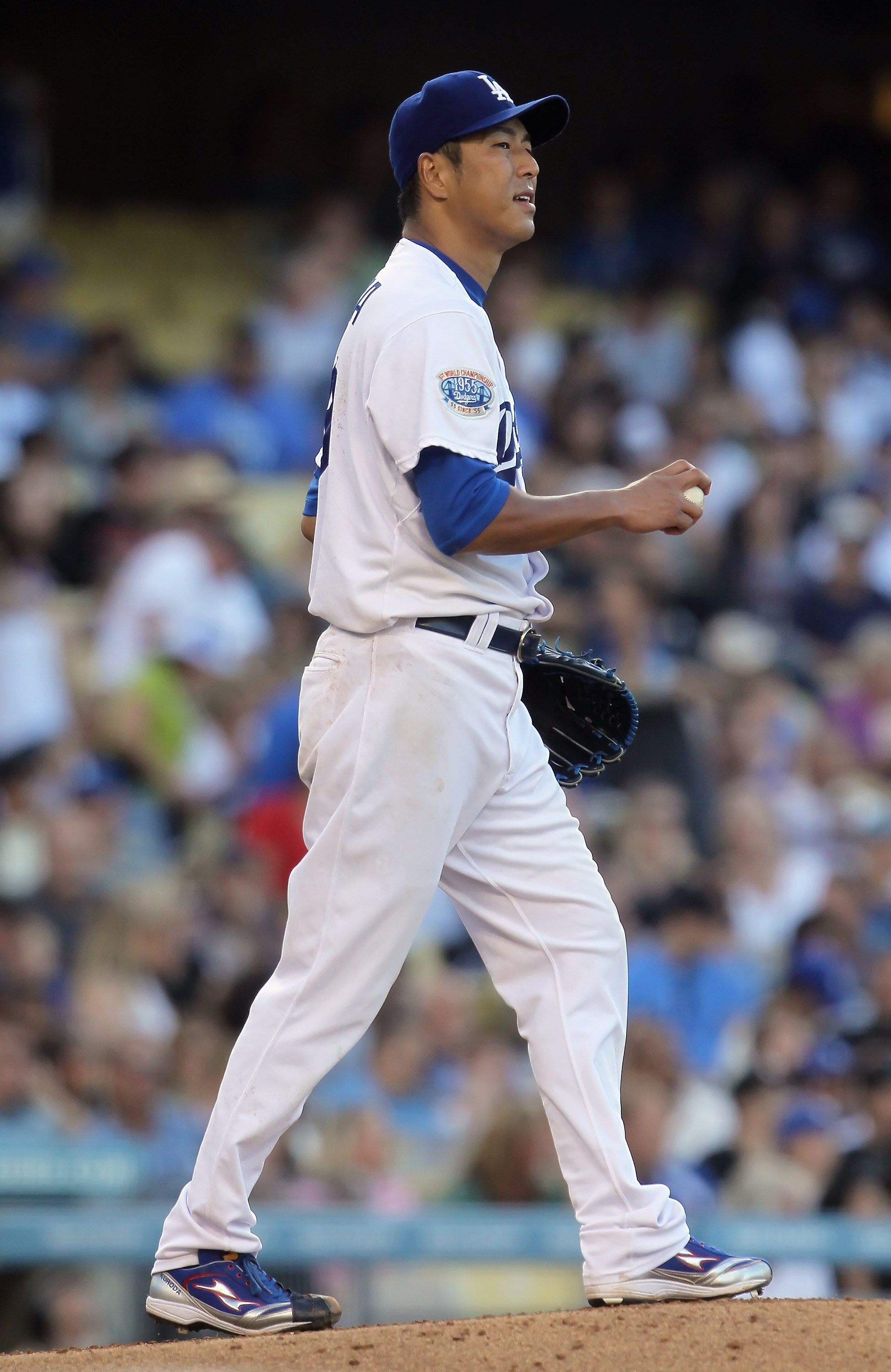 LOS ANGELES, CA - SEPTEMBER 05:  Hiroki Kuroda #18 of the Los Angeles Dodgers walks back to the mound in the fourth inning against the San Francisco Giants at Dodger Stadium on September 5, 2010 in Los Angeles, California. The Giants defeated the Dodgers