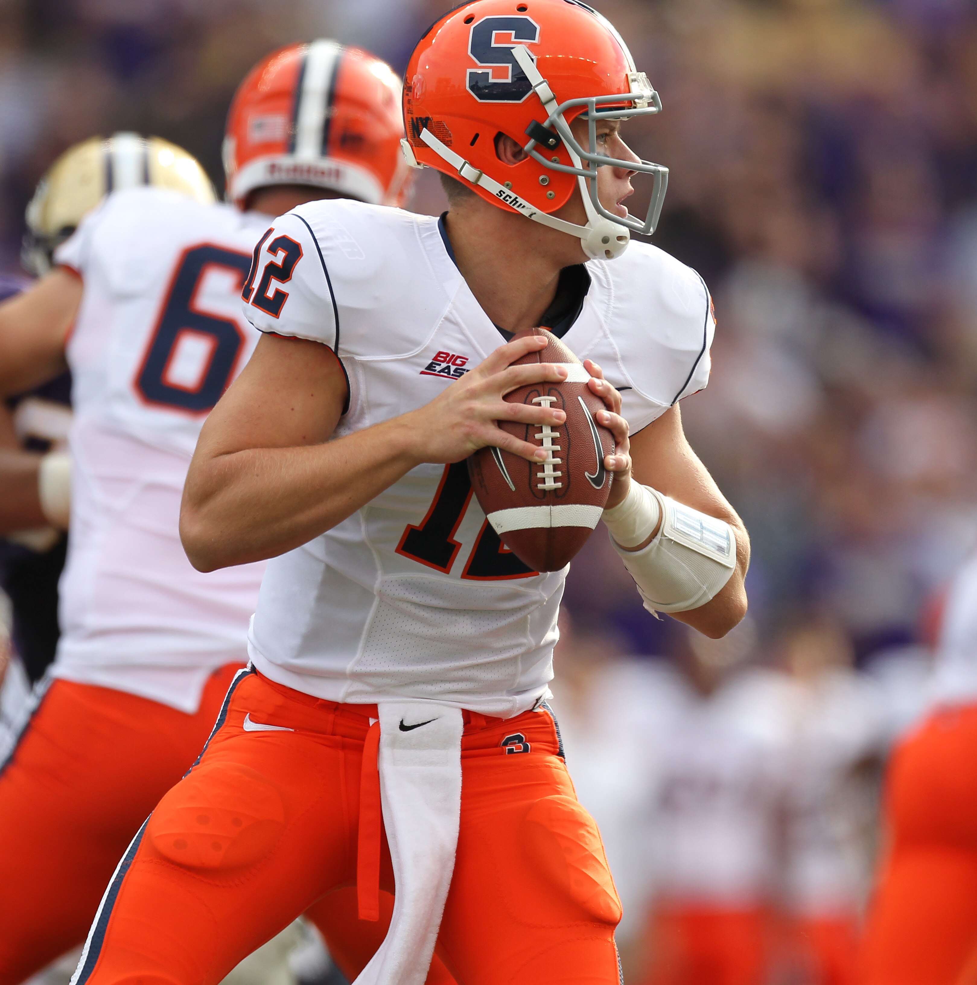 SEATTLE - SEPTEMBER 11:  Quarterback Ryan Nassib #12 of the Syracuse Orange looks to pass against the Washington Huskies on September 11, 2010 at Husky Stadium in Seattle, Washington. (Photo by Otto Greule Jr/Getty Images)