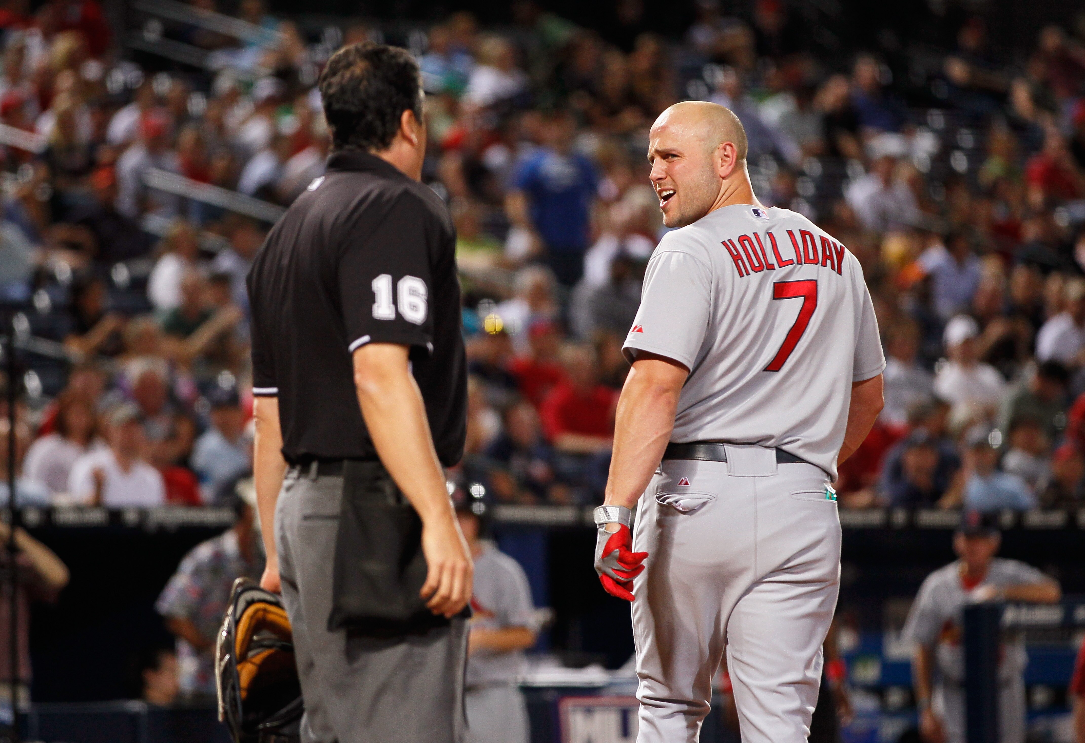 ATLANTA - SEPTEMBER 09:  Matt Holliday #7 of the St. Louis Cardinals argues with homeplate umpire Mike DiMuro #16 before getting ejected in the fourth inning against the Atlanta Braves at Turner Field on September 9, 2010 in Atlanta, Georgia.  (Photo by K