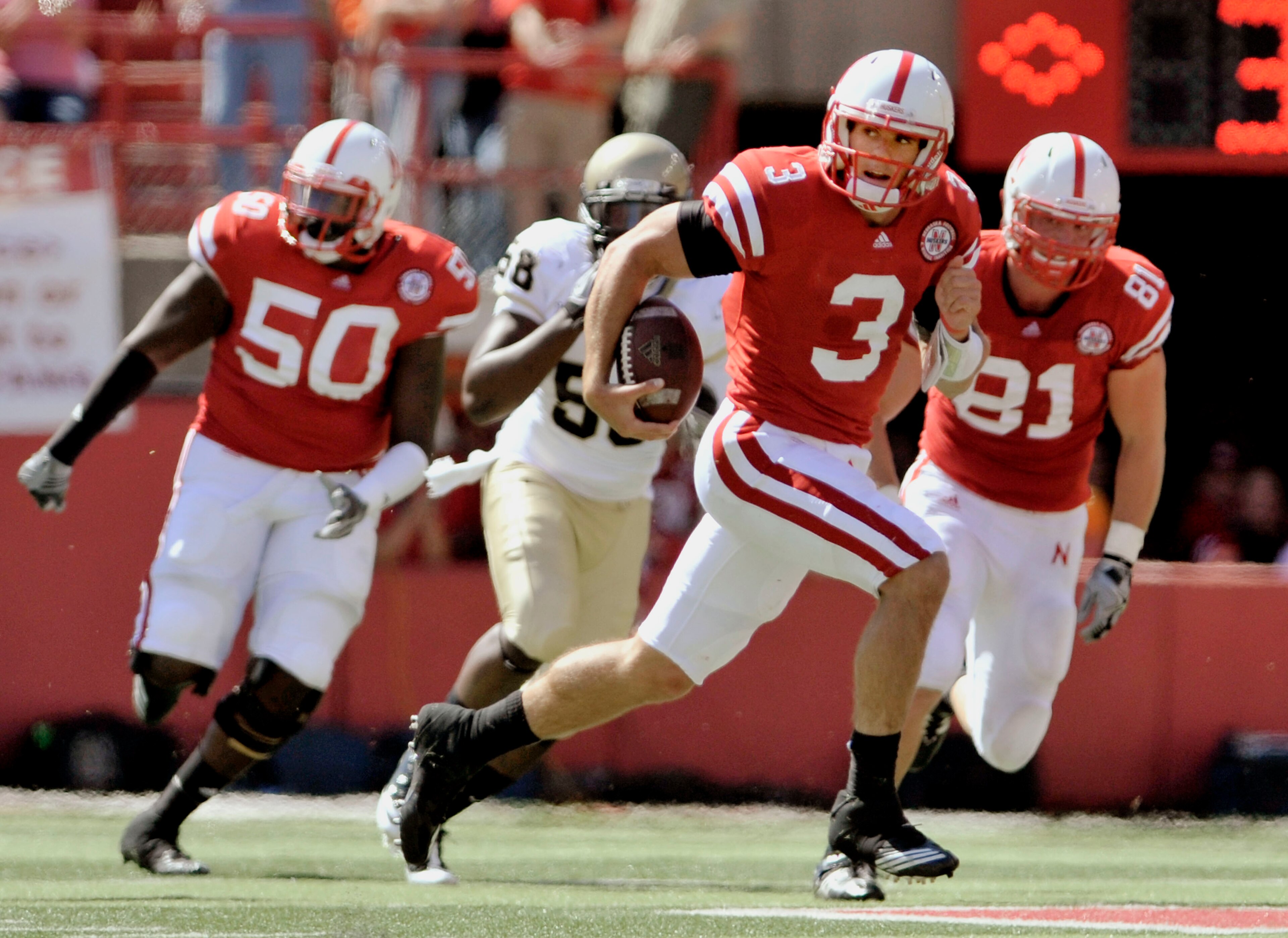 LINCOLN, NE - SEPTEMBER 11: Nebraska Cornhuskers quarterback Taylor Martinez #3 runs for his first touchdown fo the day during first half action of their game at Memorial Stadium on September 4, 2010 in Lincoln, Nebraska. Nebraska Defeated Idaho 38-17. (P