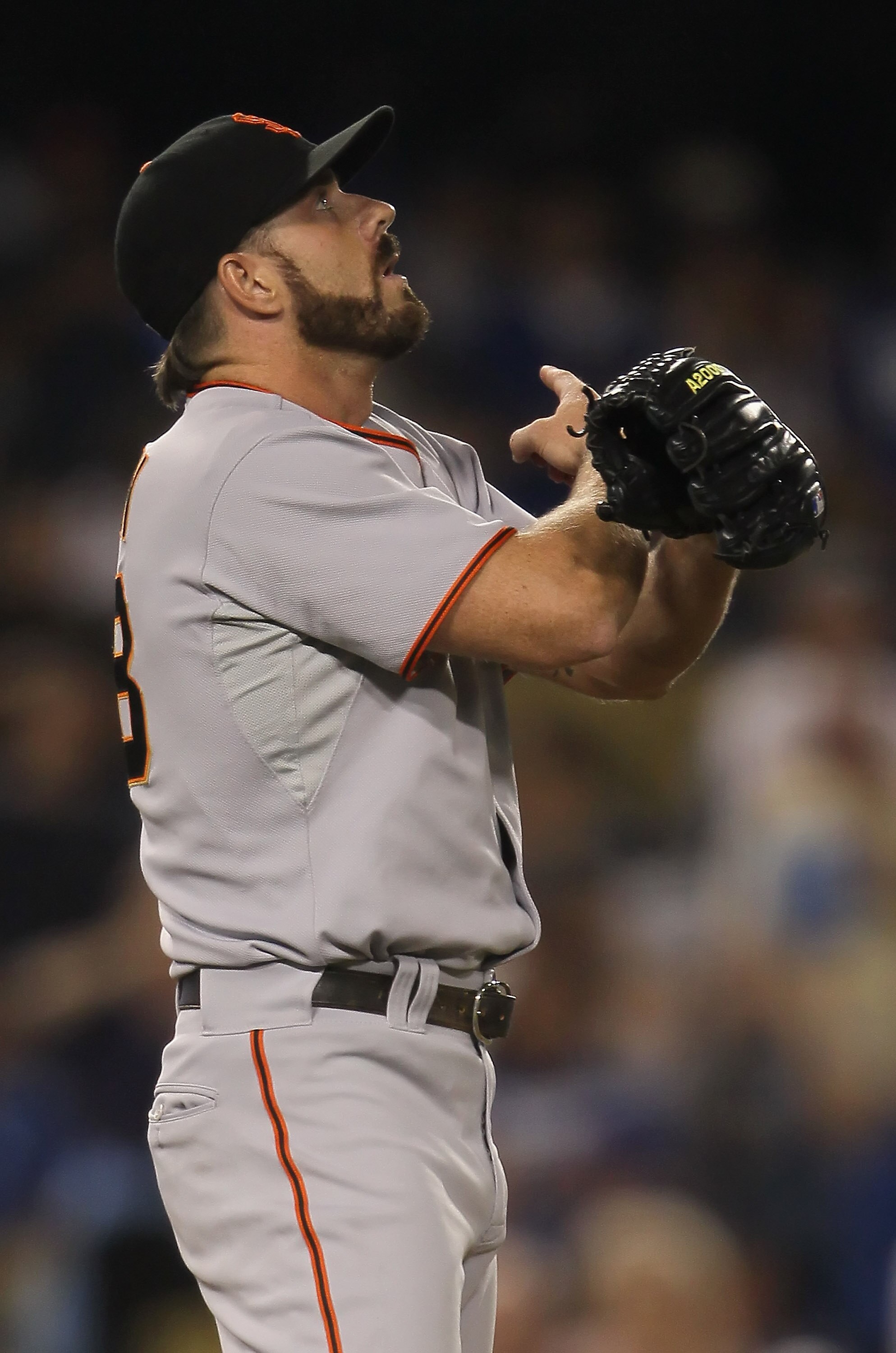 LOS ANGELES, CA - SEPTEMBER 04:  Pitcher Brian Wilson #38 of the San Francisco Giants celebrates after earning a save against the Los Angeles Dodgers at Dodger Stadium on September 4, 2010 in Los Angeles, California. The Giants defeated the Dodgers 5-4.