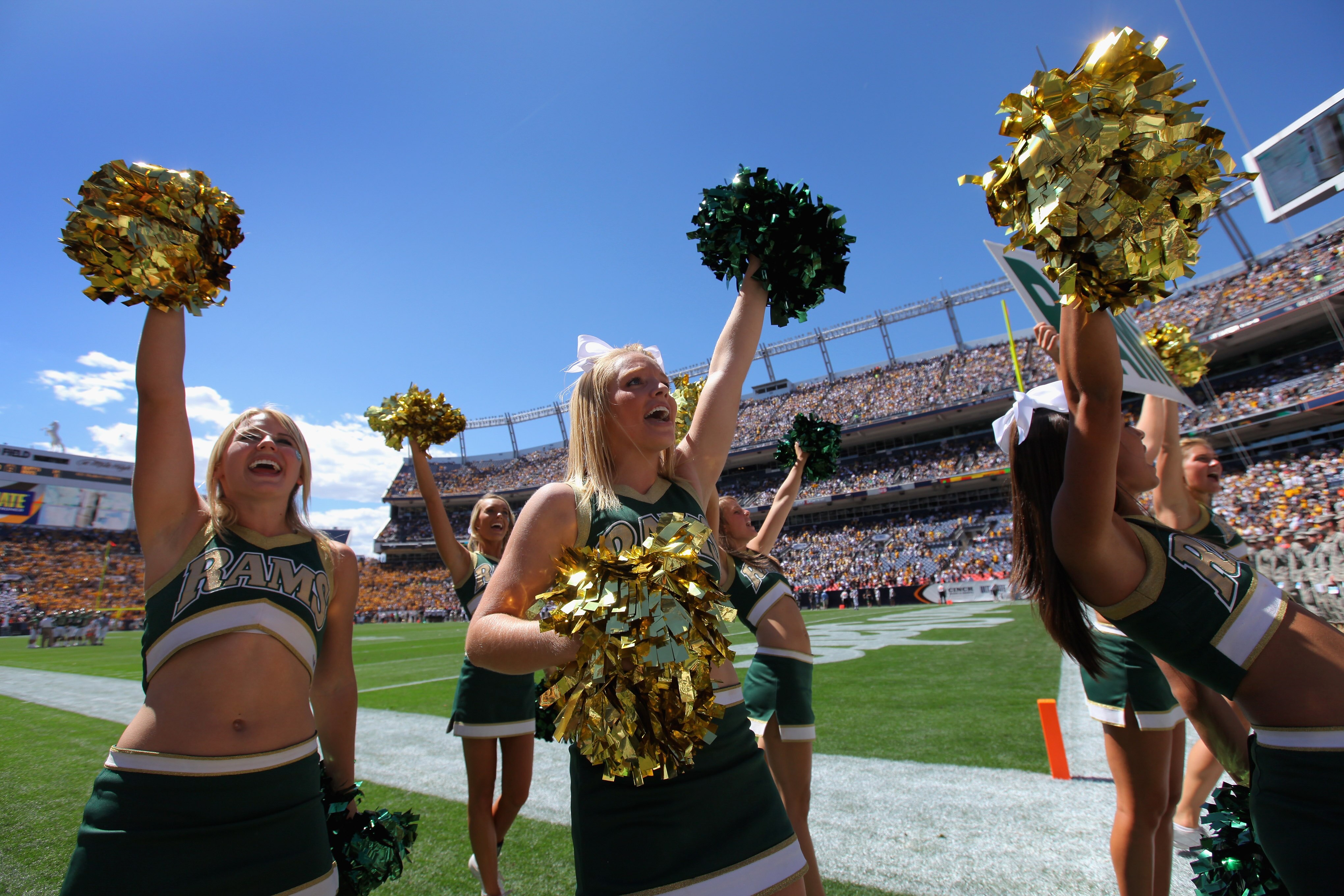 DENVER - SEPTEMBER 04:  The Colorado State Rams cheerleaders support their team as the Rams face the Colorado Buffaloes during the the Rocky Mountain Showdown at INVESCO Field at Mile High on September 4, 2010 in Denver, Colorado.  (Photo by Doug Pensinge