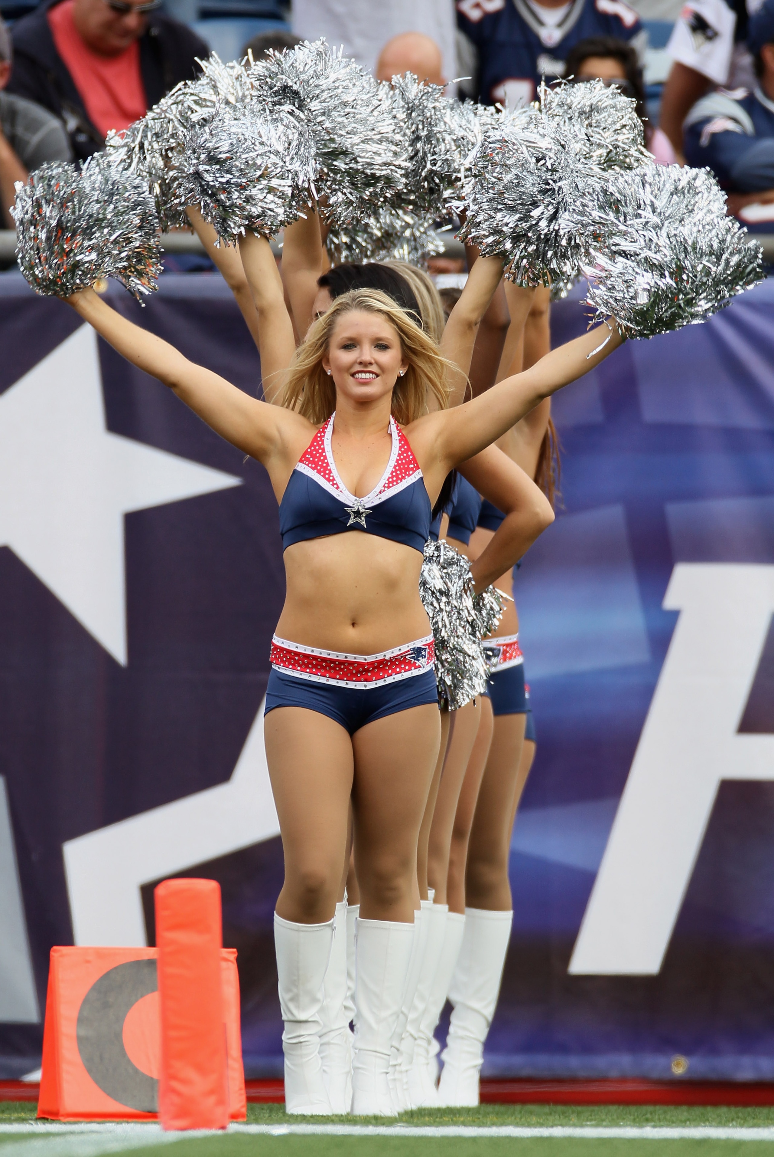 FOXBORO, MA - SEPTEMBER 12:  The New England Patriots cheerleaders entertain fans in the first half against the Cincinnati Bengals during the NFL season opener on September 12, 2010 at Gillette Stadium in Foxboro, Massachusetts.  (Photo by Elsa/Getty Imag