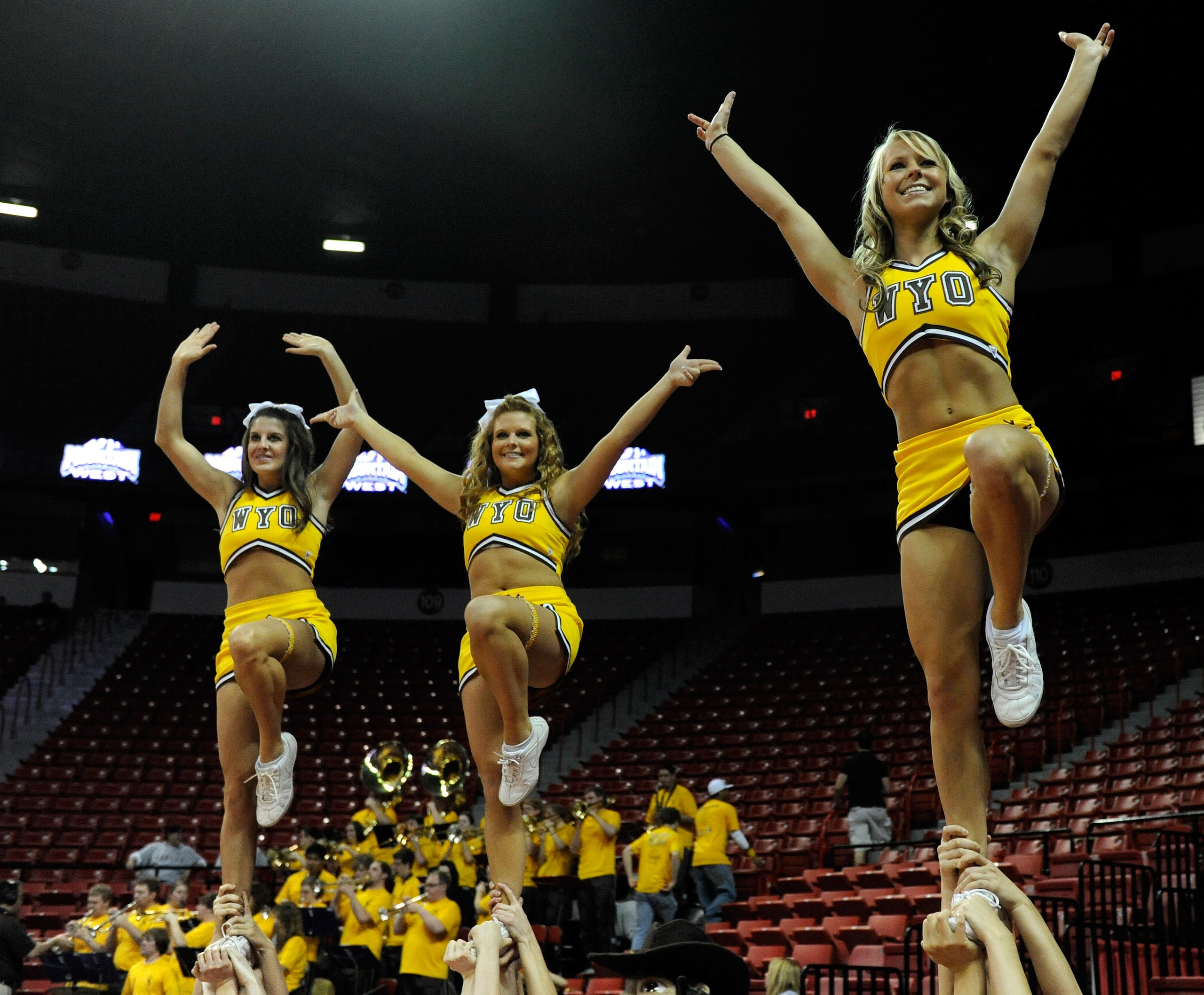 LAS VEGAS - MARCH 10:  Wyoming cheerleaders perform as the Cowboys take on the Air Force Falcons during the first round of the Conoco Mountain West Conference Basketball tournament at the Thomas & Mack Center March 10, 2010 in Las Vegas, Nevada.  (Photo b
