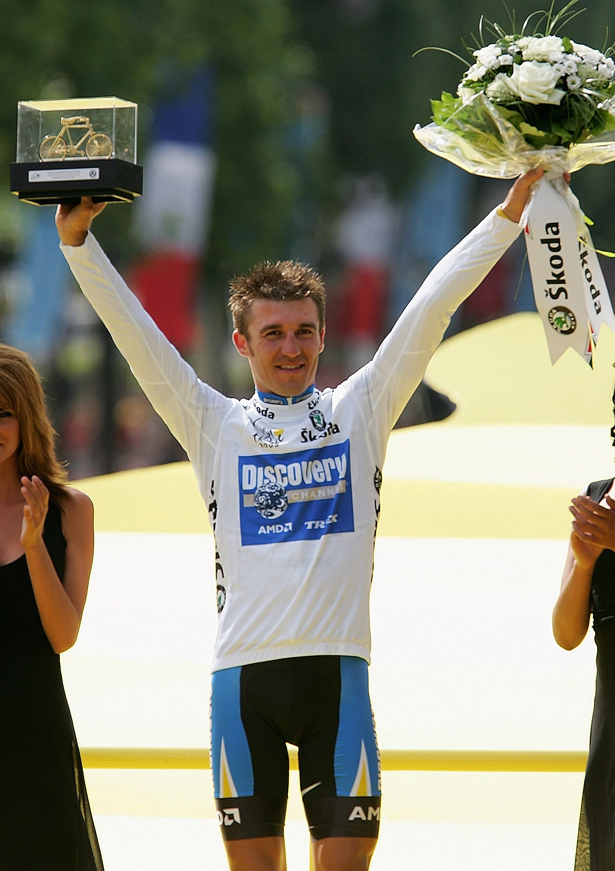 PARIS - JULY 24: Yaroslav Popovych of Ukraine riding for the Discovery Channel Team acknowledges the crowd from the podium after Stage 21 of the Tour de France between Montereau and The Champs Elysees on July 24, 2005 in Paris, France. (Photo by Robert PARIS - JULY 24: Yaroslav Popovych of Ukraine riding for the Discovery Channel Team acknowledges the crowd from the podium after Stage 21 of the Tour de France between Montereau and The Champs Elysees on July 24, 2005 in Paris, France. (Photo by Robert