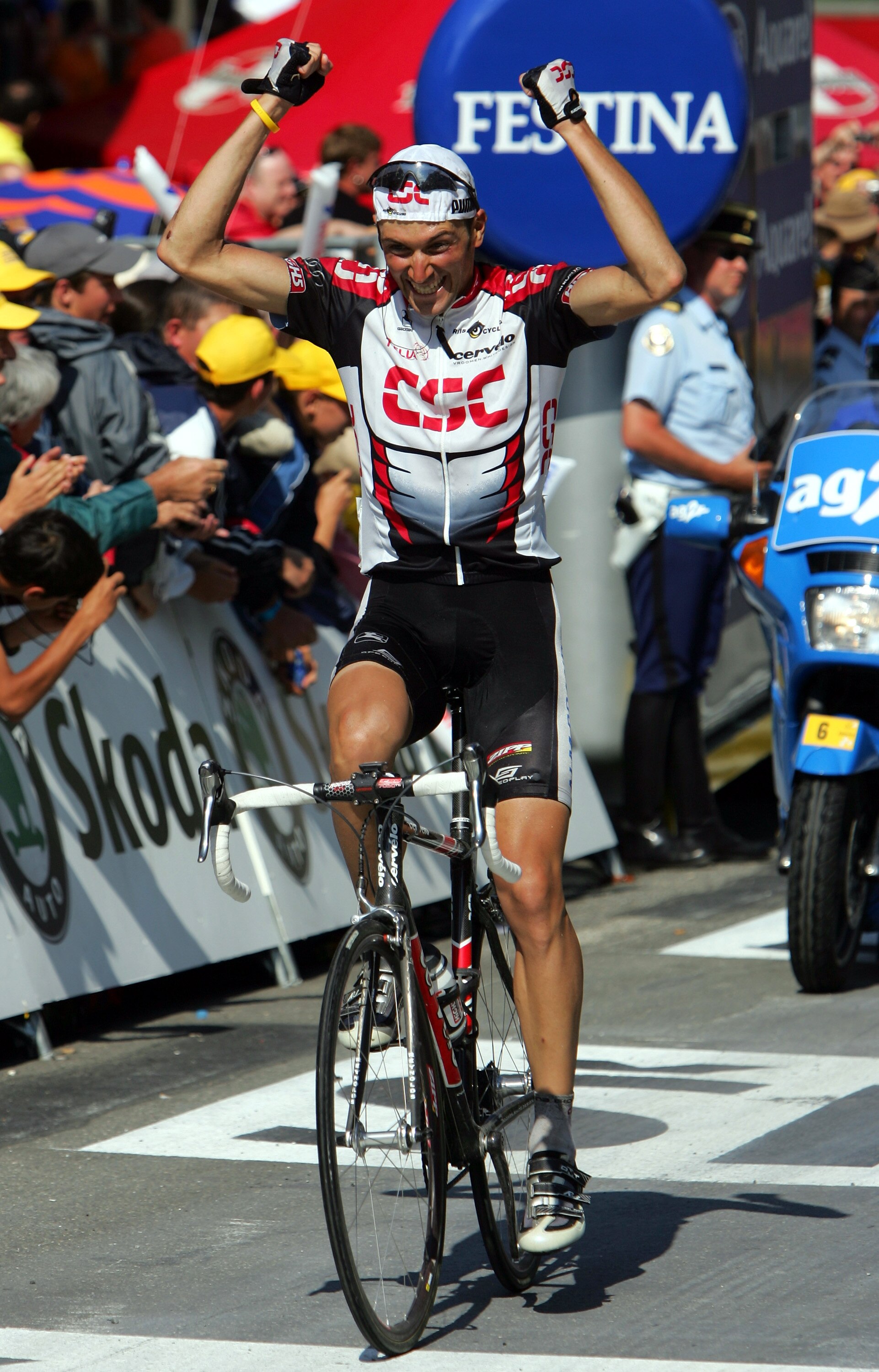 LA MONGIE, FRANCE- JULY 16: Ivan Basso of Italy of the CSC team celebrates as he wins Stage 12 of the Tour de France between Castelsarrasin and La Mongie on July 16, 2004 in La Mongie, France. (Photo by Robert Laberge/Getty Images) LA MONGIE, FRANCE- JULY 16: Ivan Basso of Italy of the CSC team celebrates as he wins Stage 12 of the Tour de France between Castelsarrasin and La Mongie on July 16, 2004 in La Mongie, France. (Photo by Robert Laberge/Getty Images)