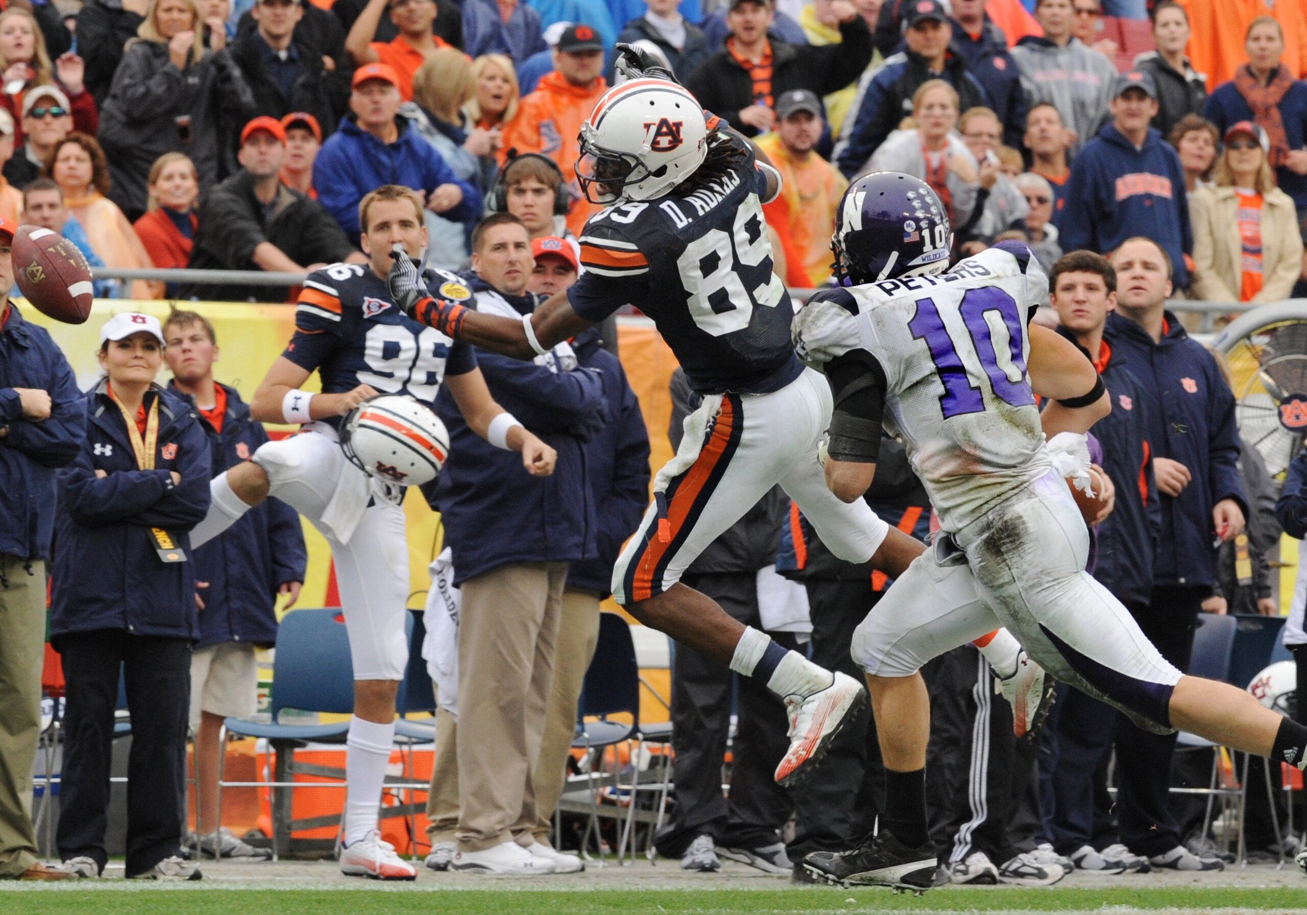 TAMPA, FL - JANUARY 1: Wide receiver Darvin Adams #89 of the Auburn Tigers stretches for a pass against the Northwestern Wildcats in the Outback Bowl January 1, 2010 at Raymond James Stadium in Tampa, Florida.  (Photo by Al Messerschmidt/Getty Images)