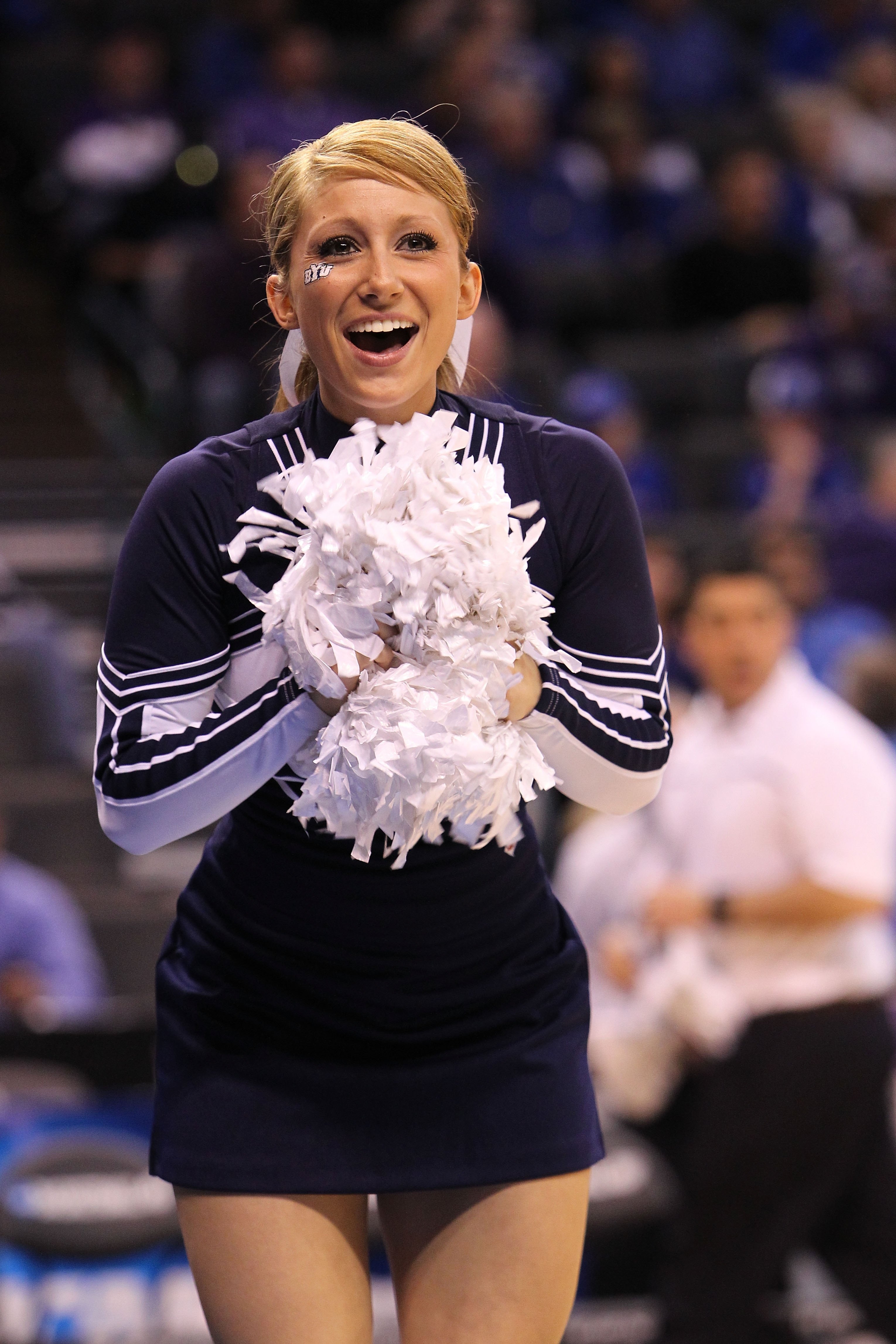 OKLAHOMA CITY - MARCH 20:  A cheerleader from the Brigham Young Cougars performs against the Kansas State Wildcats during the second round of the 2010 NCAA men's basketball tournament at Ford Center on March 20, 2010 in Oklahoma City, Oklahoma.  (Photo by