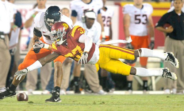 Nickell Robey knocks down a pass to Virginia tight end Joe Torchia