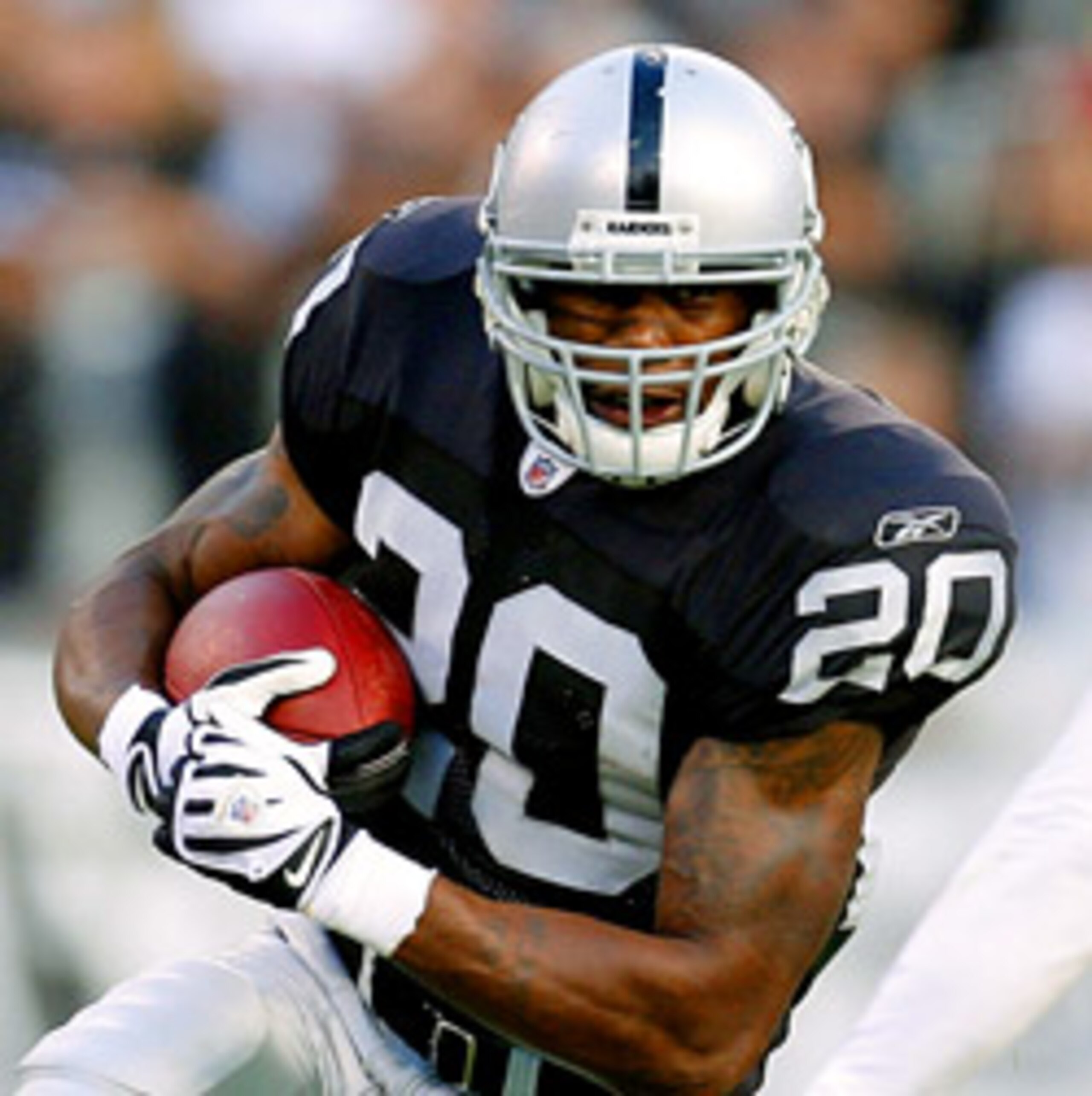 Darren McFadden running hard.