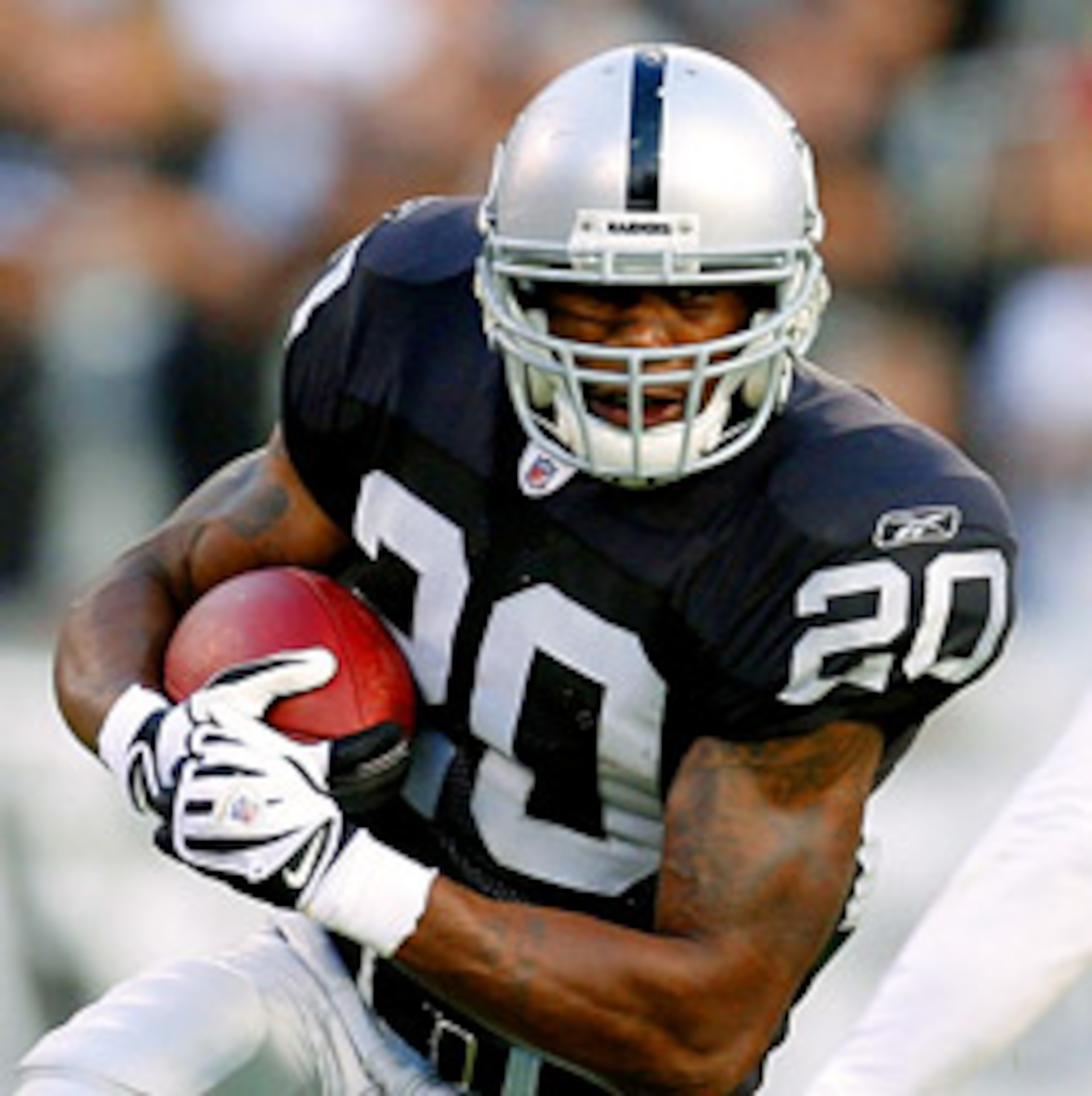Darren McFadden running hard.