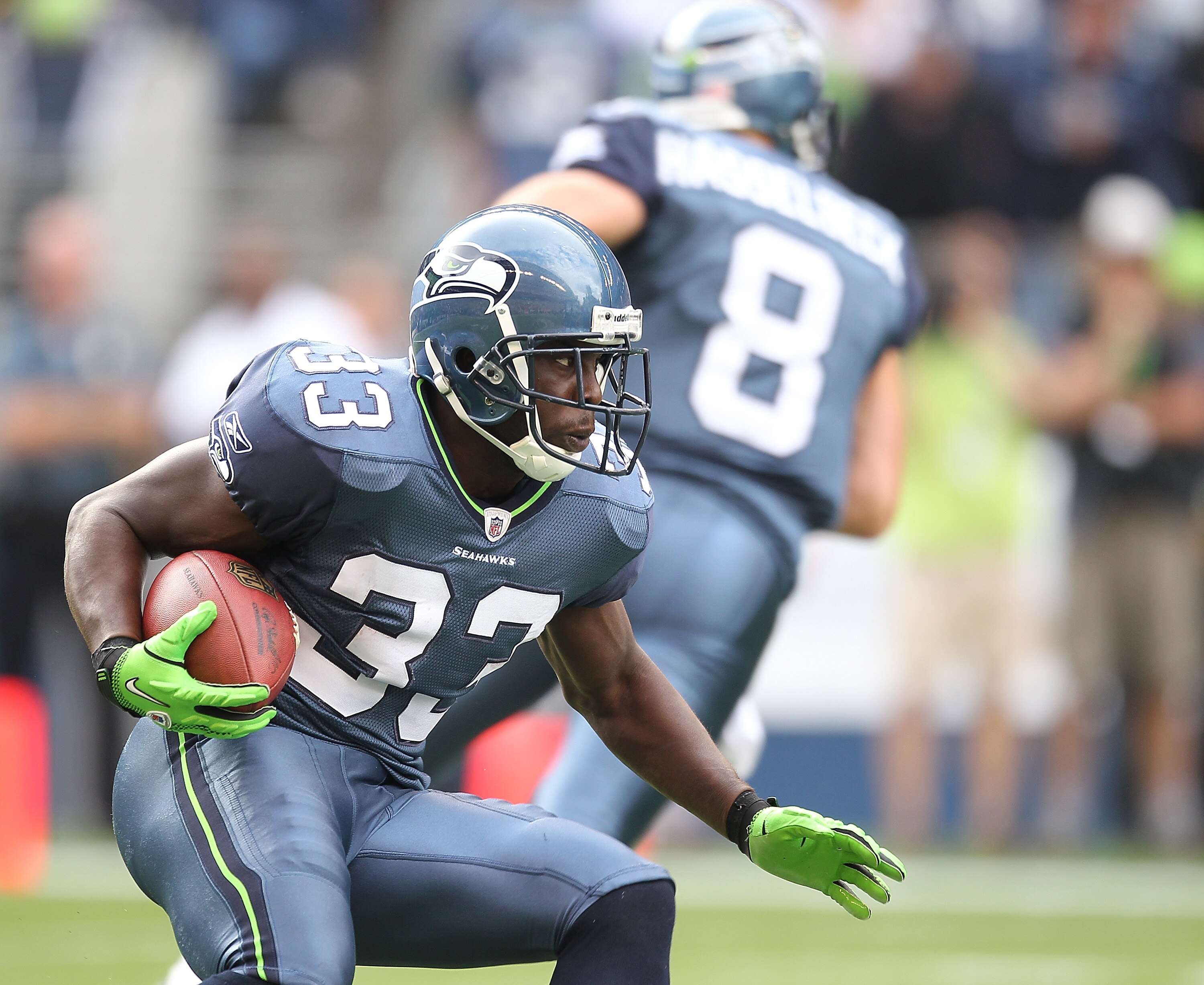SEATTLE - SEPTEMBER 12:  Running back Leon Washington #33 of the Seattle Seahawks rushes during the NFL season opener against the San Francisco 49ers at Qwest Field on September 12, 2010 in Seattle, Washington. (Photo by Otto Greule Jr/Getty Images)