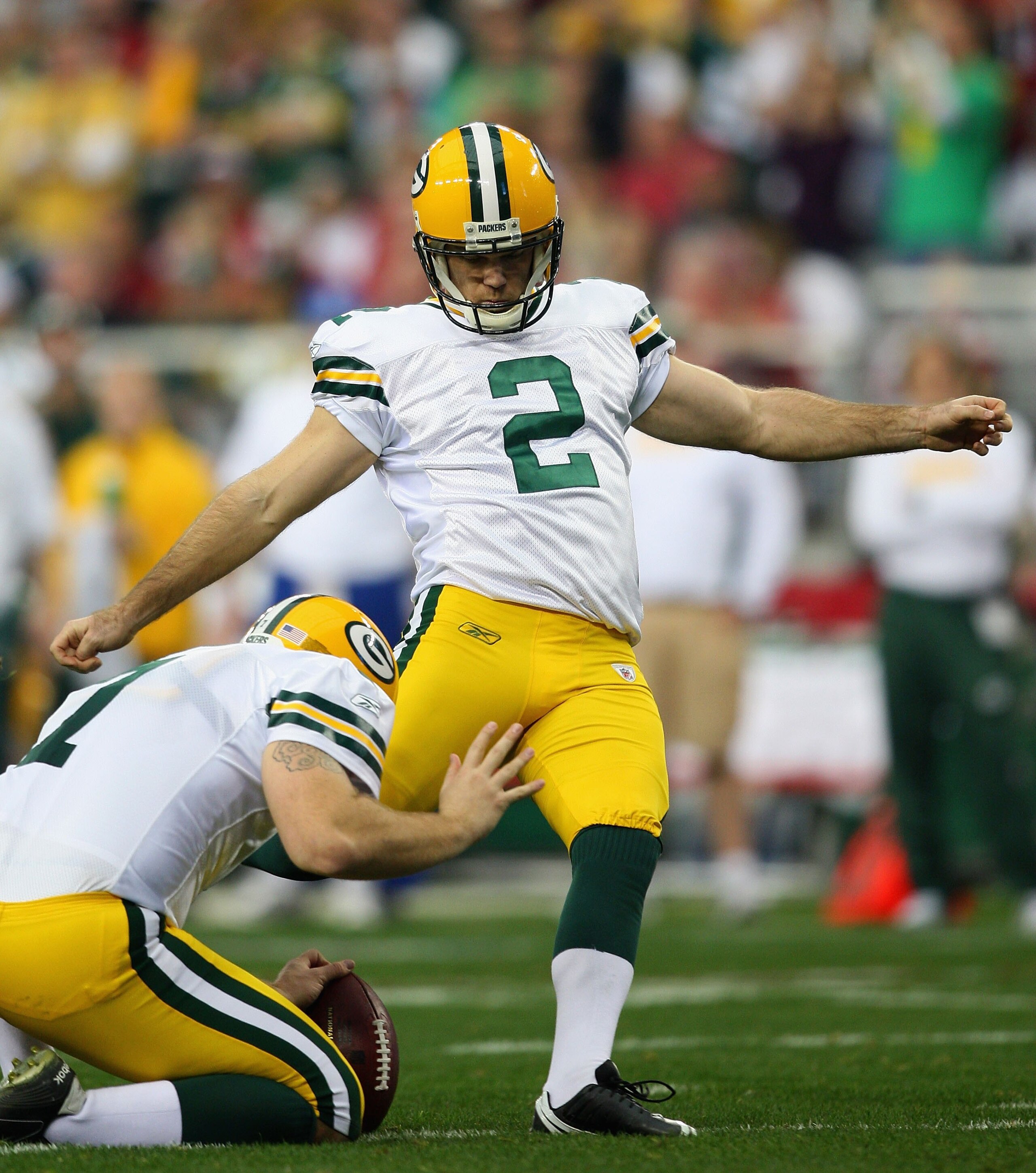 GLENDALE, AZ - JANUARY 03:  Kicker Mason Crosby #2 of the Green Bay Packers kicks a field goal during the NFL game against the Arizona Cardinals at the Universtity of Phoenix Stadium on January 3, 2010 in Glendale, Arizona.  The Packers defeated the Cardi